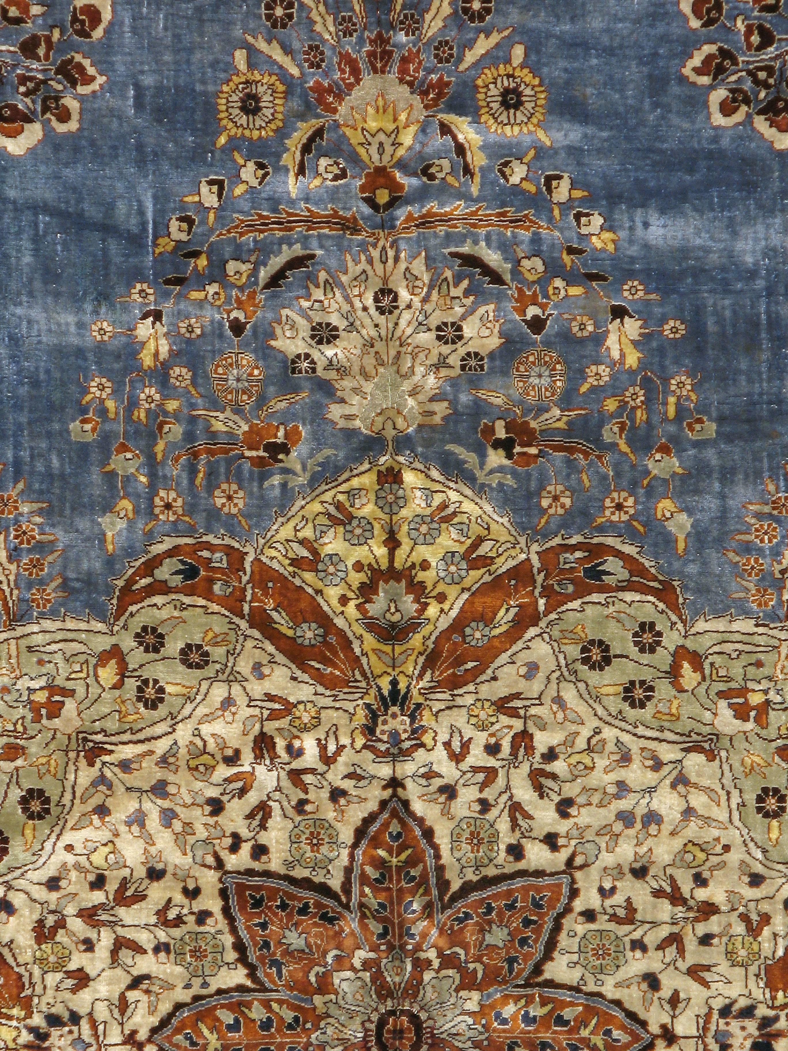 A vintage Turkish silk Herekeh carpet from the mid-20th century.