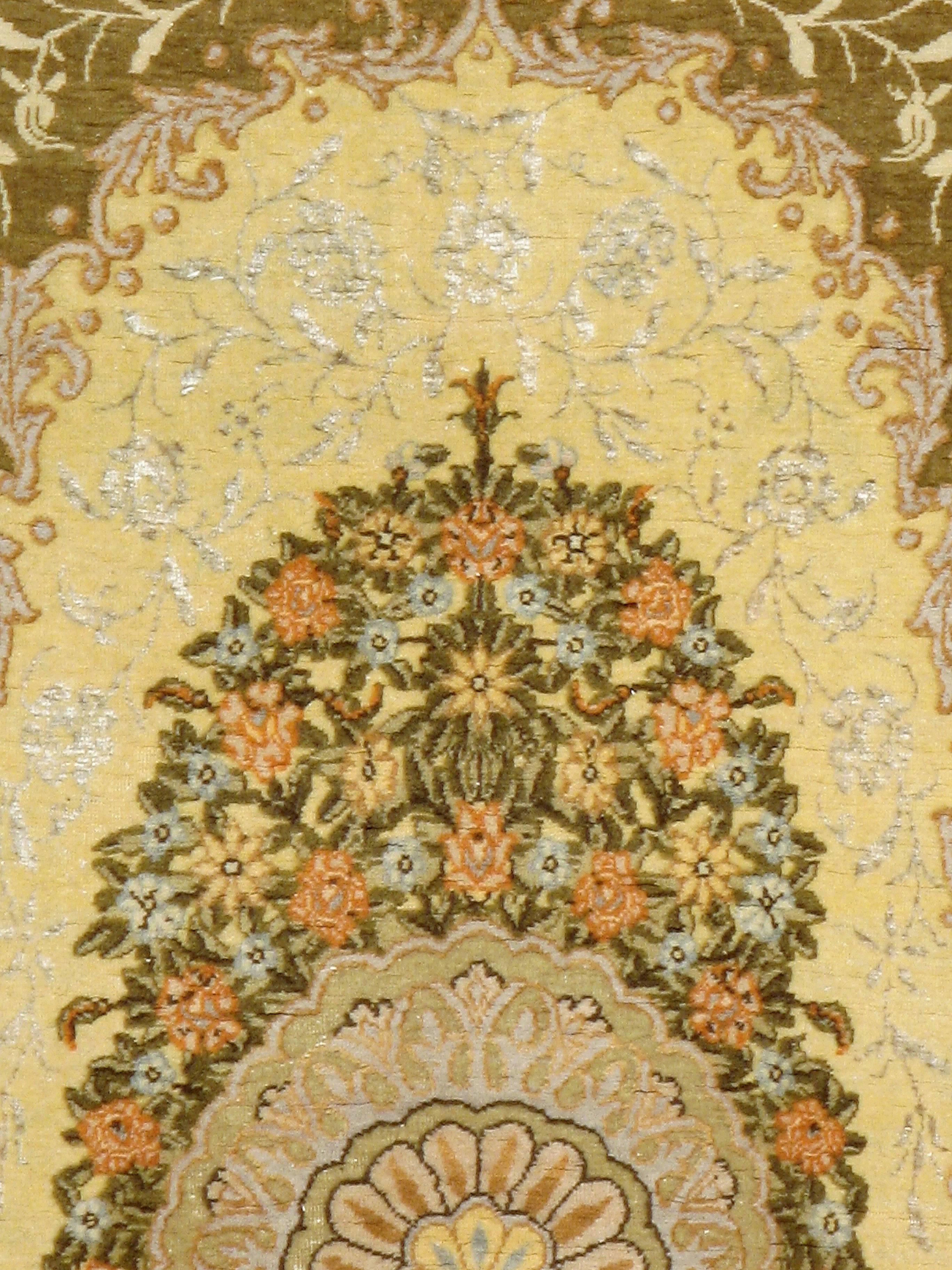 A vintage Turkish Herekeh carpet from the mid-20th century with silk highlights.