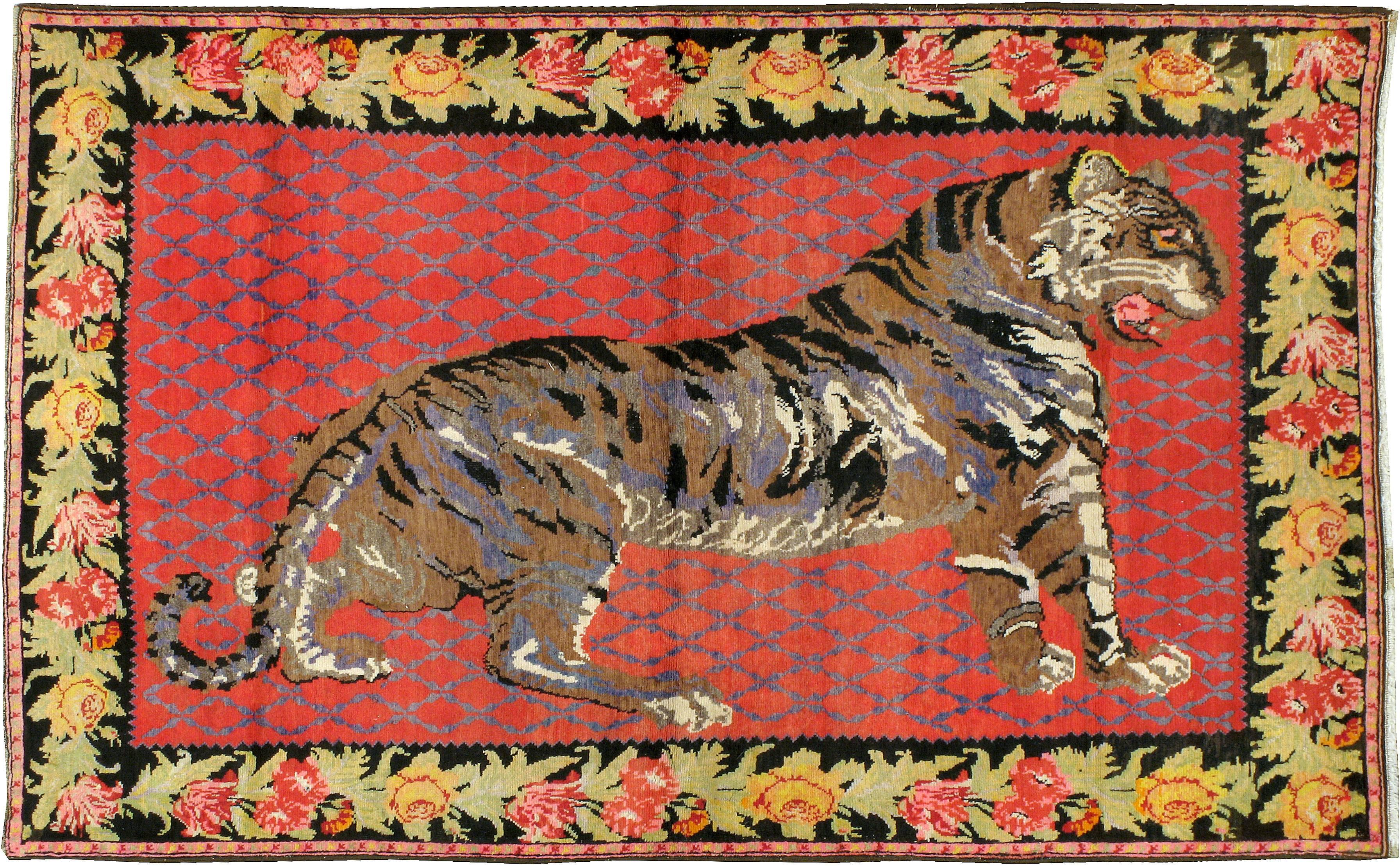 An antique Russian Karabagh carpet from the first quarter of the 20th century with a pictorial design of a tiger.