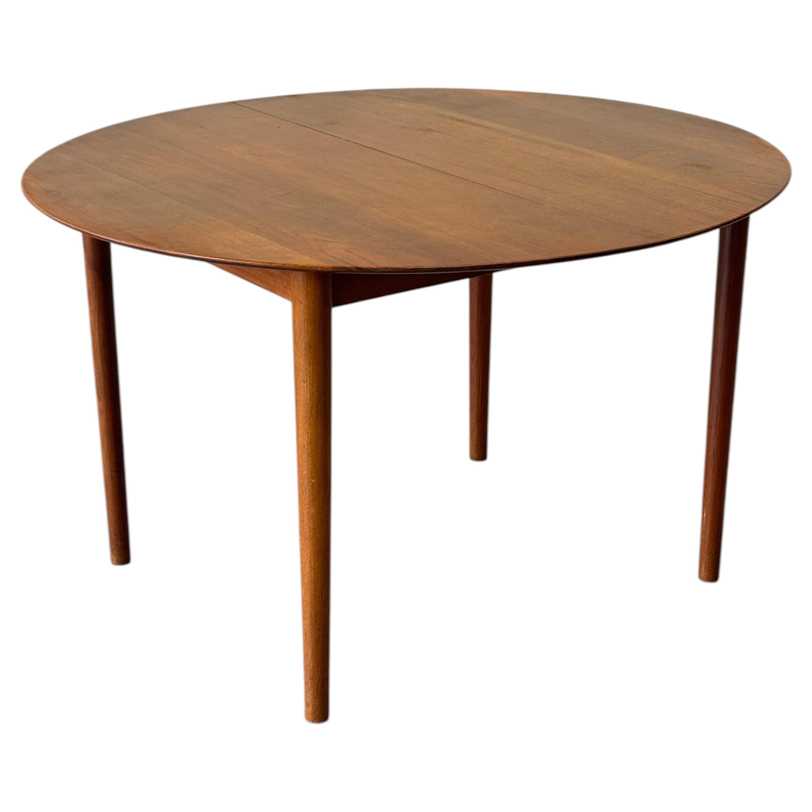 Table à manger extensible en teck des années 1950, conçue par Peter Hvidt et Orla Mølgaard-Nielsen en vente