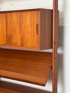 1960s Danish Teak Modular Wall Unit by Arne Hovmand-Olsen for Jutex, Denmark.
