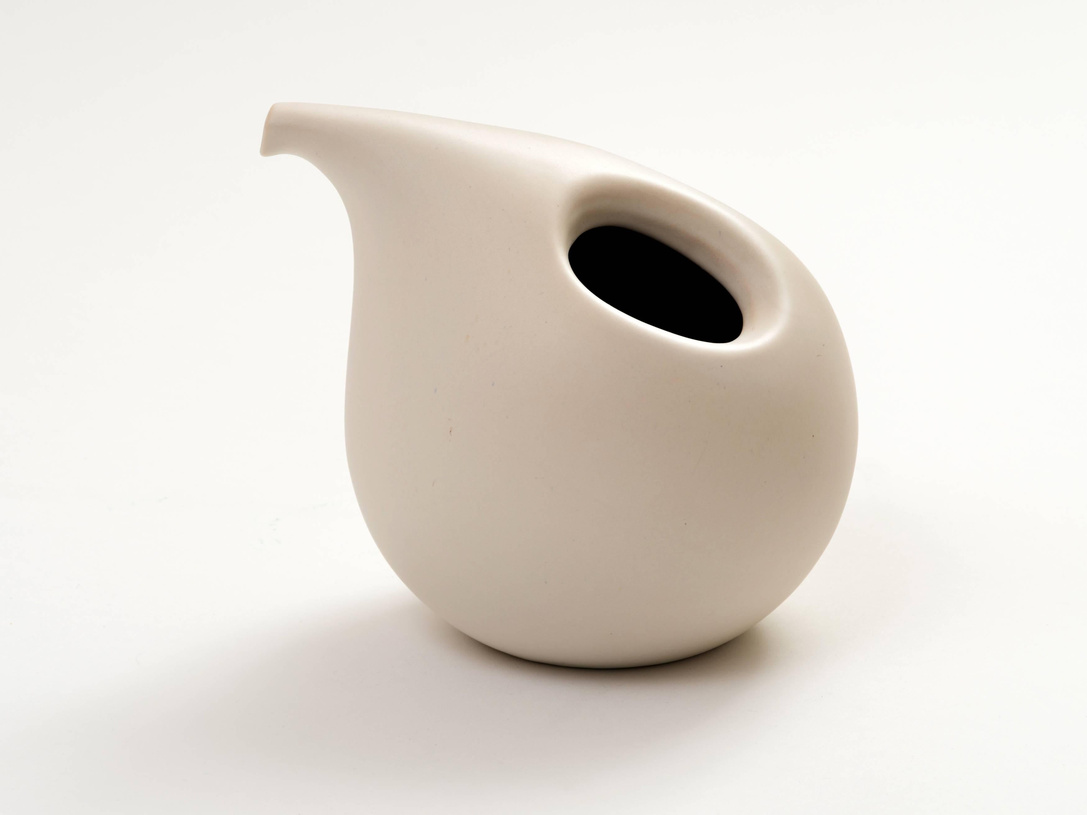 white ceramic vase with handles