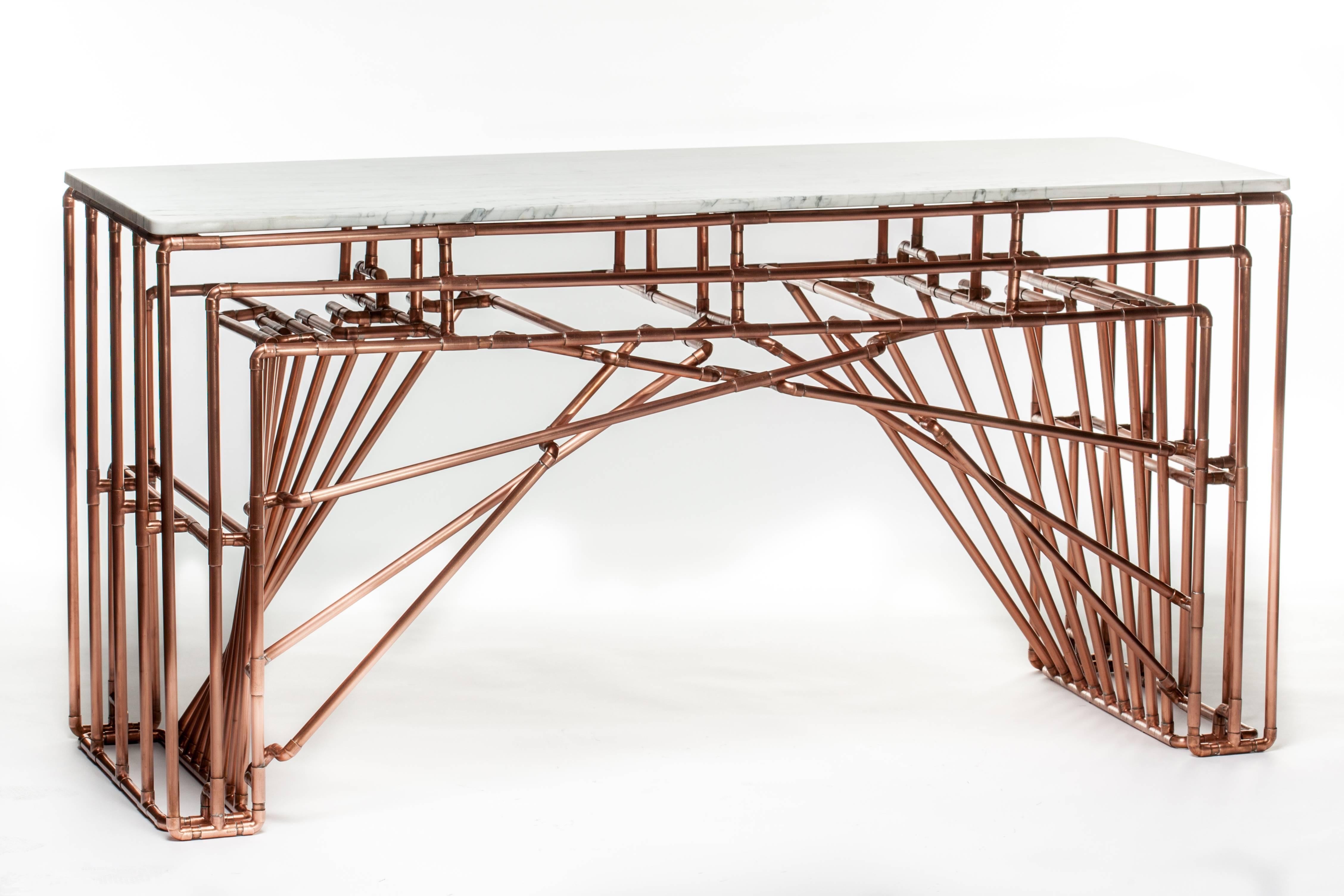 Title: Brooklyn-Barcelona Table
Year: 2013

The Brooklyn-Barcelona console table is a graceful merger of styles and continents. The under-arch is designed to evoke the iconic cabling of the Brooklyn Bridge and the negative space it creates is in
