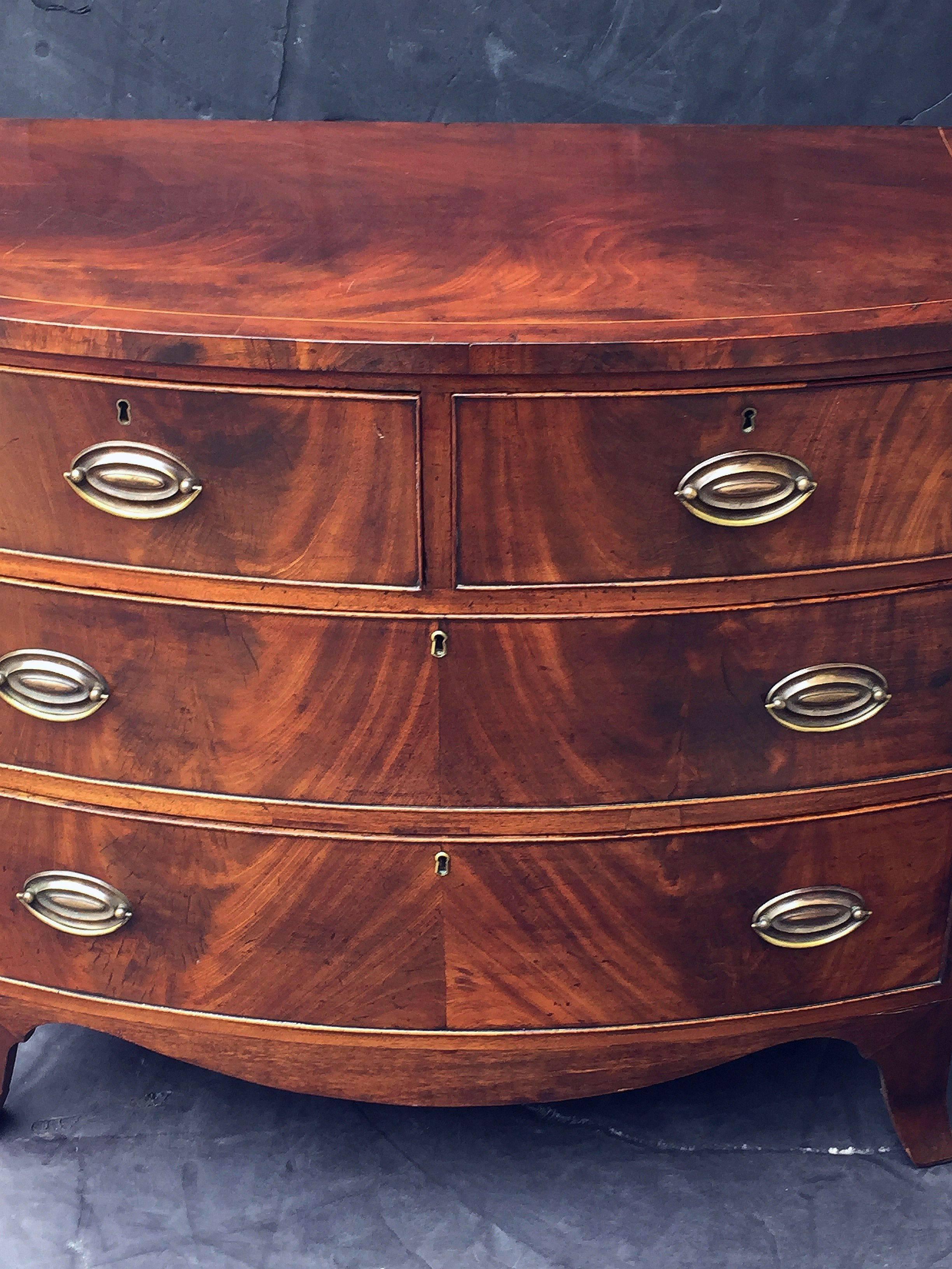 English Bow Front Chest of Inlaid Flame-Cut Mahogany In Excellent Condition In Austin, TX