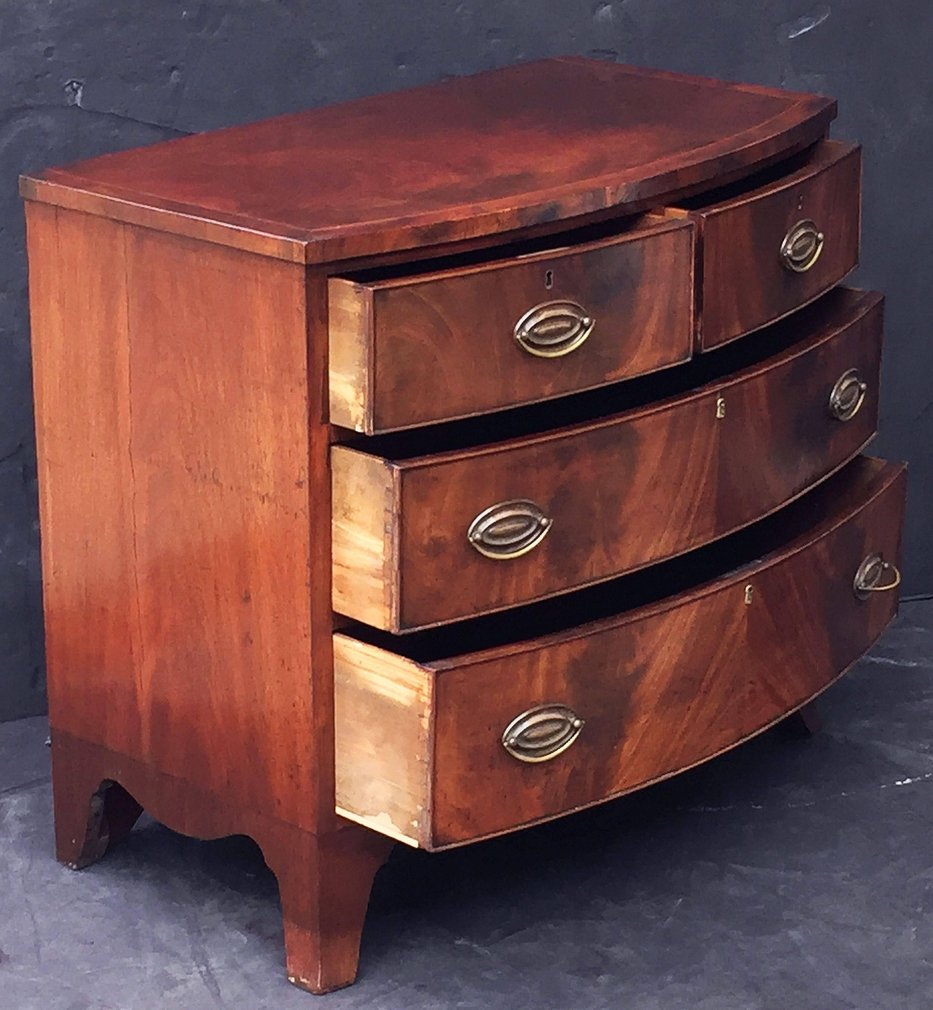 English Bow Front Chest of Inlaid Flame-Cut Mahogany 1