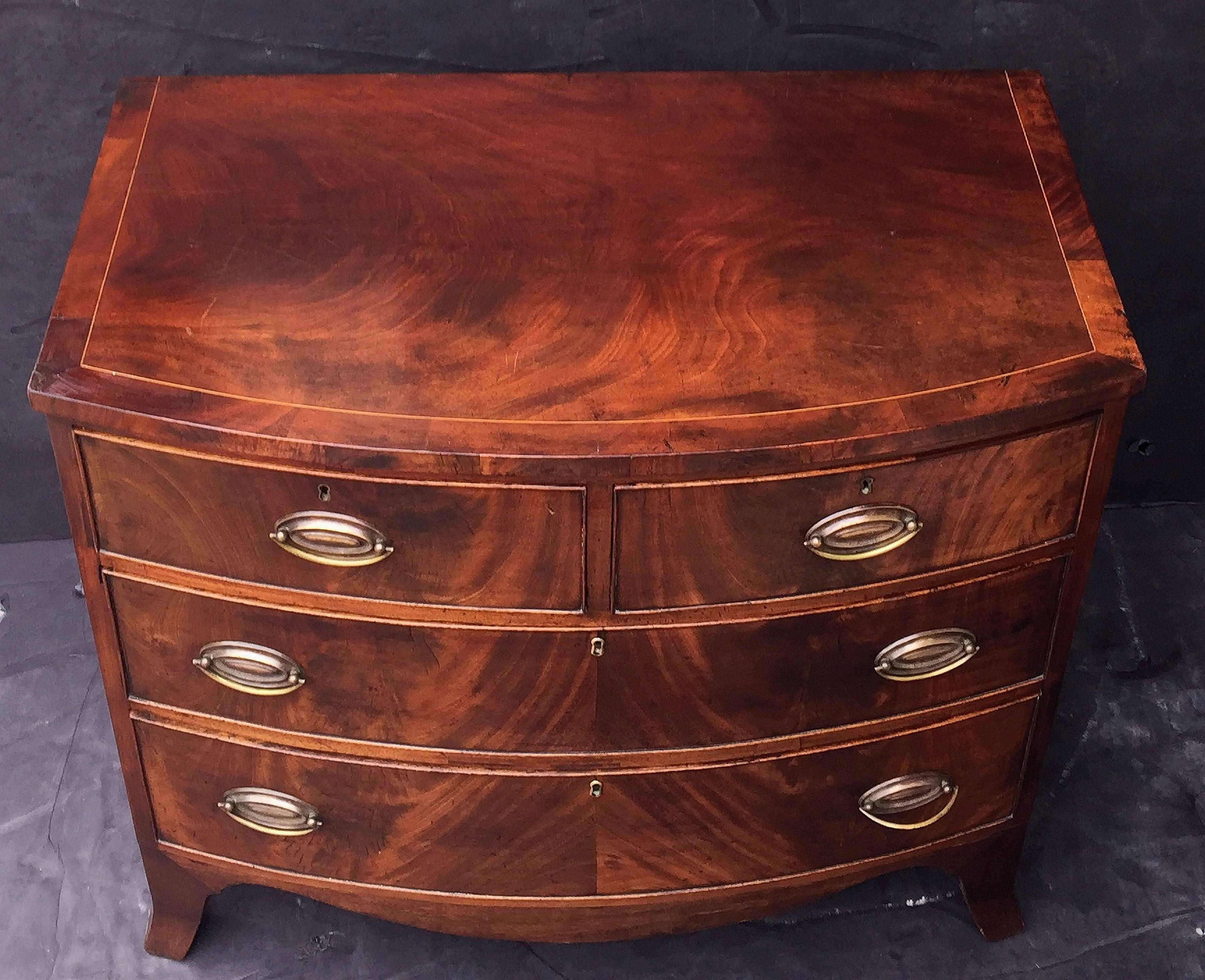 19th Century English Bow Front Chest of Inlaid Flame-Cut Mahogany