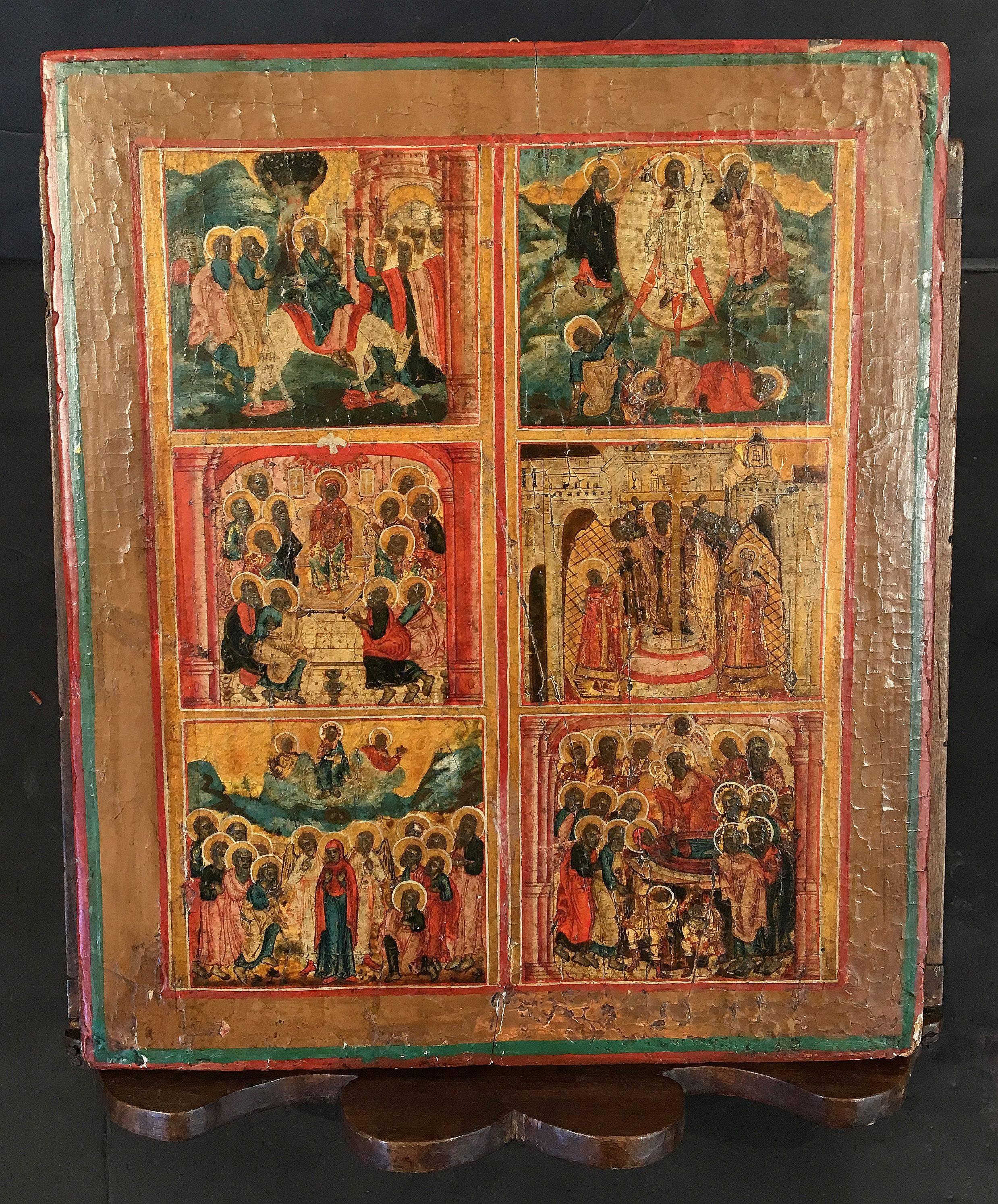 A fine Italian icon from the 18th century, featuring six religious or ecclesiastical scenes depicted with paint on a wood ground, displayed on an adjustable wood easel stand.

Icon measures H 12 in. x W 10 1/2 in x D 1 in.

The stand is slightly