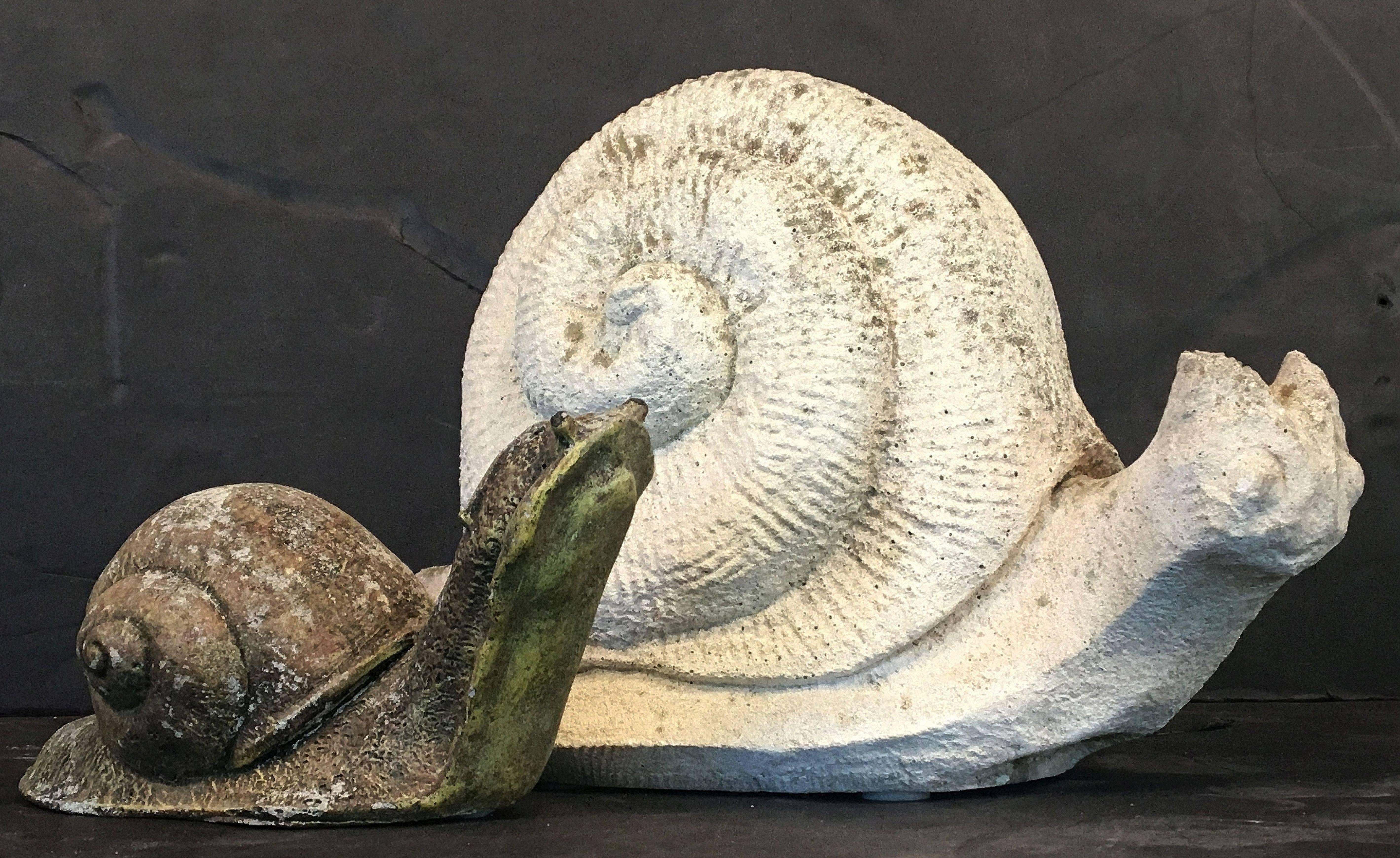 A large English garden ornamental snail of composition stone.

Perfect for a garden room or conservatory!
