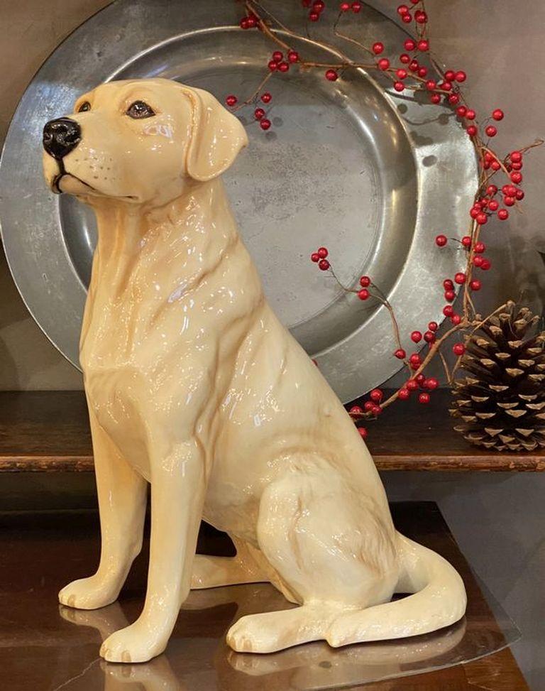 A handsome figure of a golden Labrador (or yellow Lab) dog by the celebrated English pottery firm, Beswick.
This dog is known as the fireside model.
The dog model stands approximately 13 inches in height and is in excellent condition.
Impressed