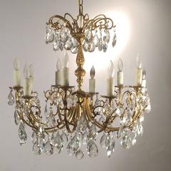 Continental Gilt Metal and Crystal Drop Ten-Light Chandelier