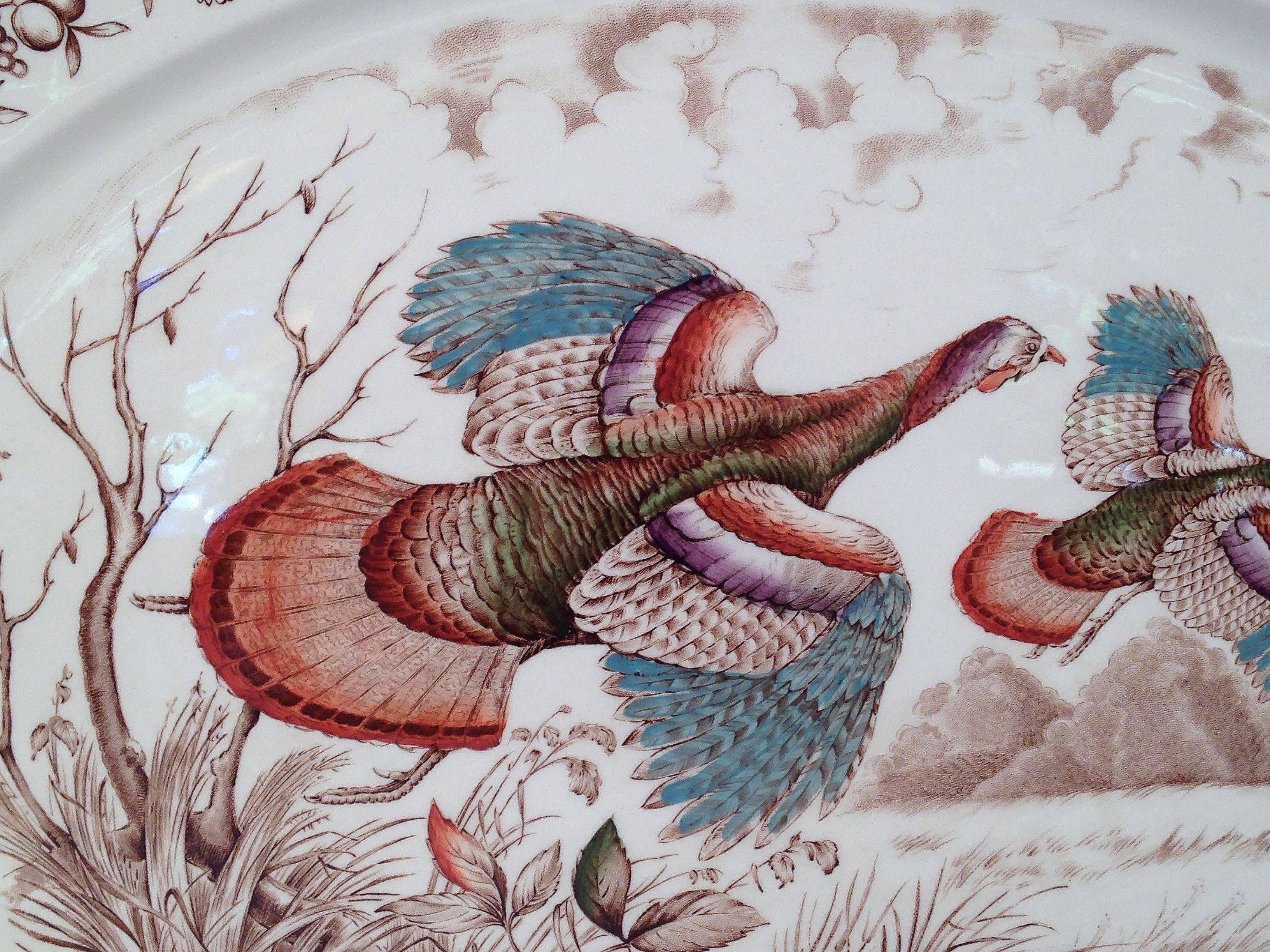 A large vintage serving platter featuring the Wild Turkeys 