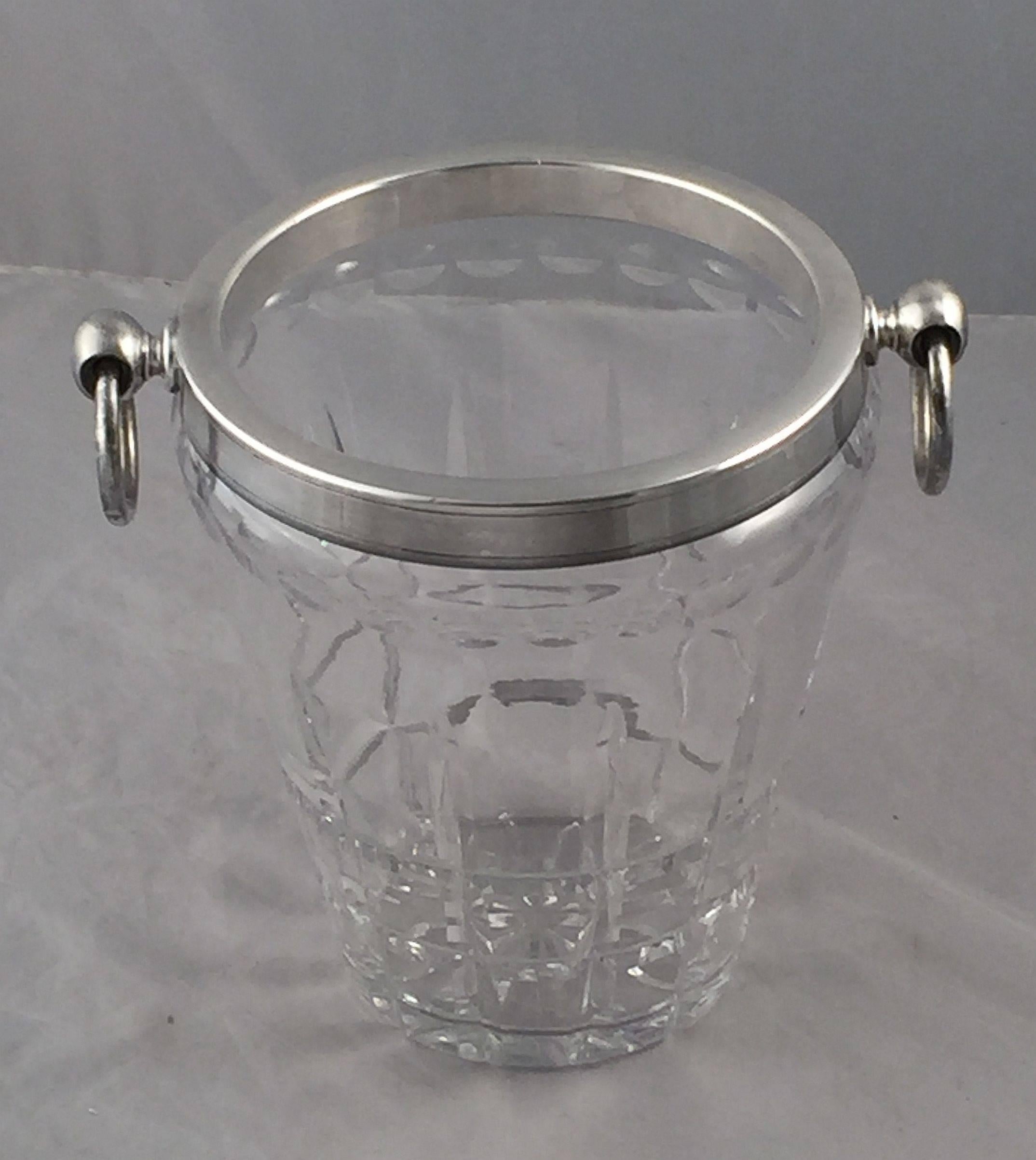 A fine vintage large French wine cooler and ice bucket of silver and cut crystal glass, featuring handsome clean lines and two opposing ring handles.

H 9 1/4