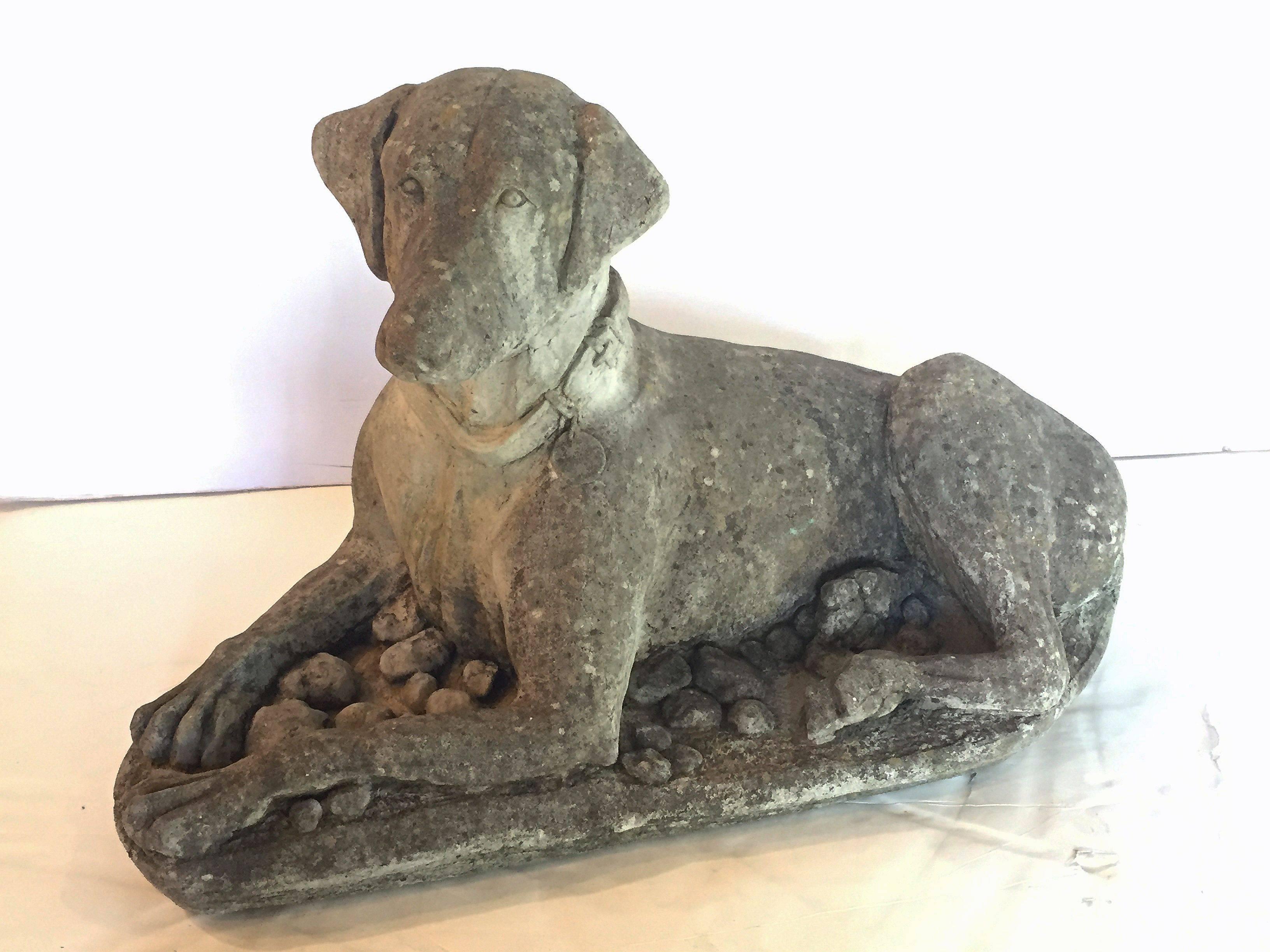 A handsome large English garden stone dog featuring a Labrador in a reclining or recumbent pose with a collar around his neck.

Perfect for a garden room or conservatory!
