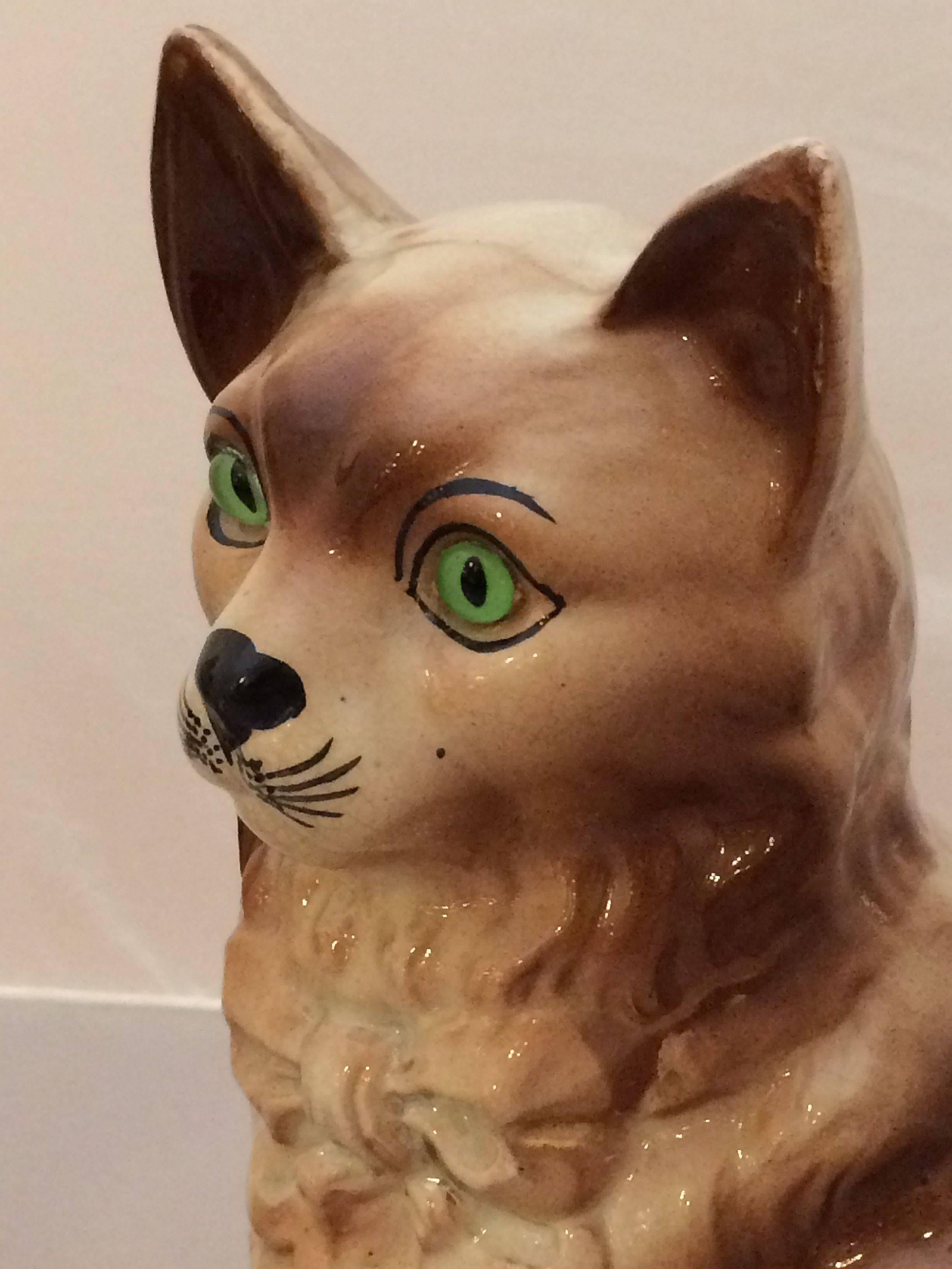 pottery cats with glass eyes