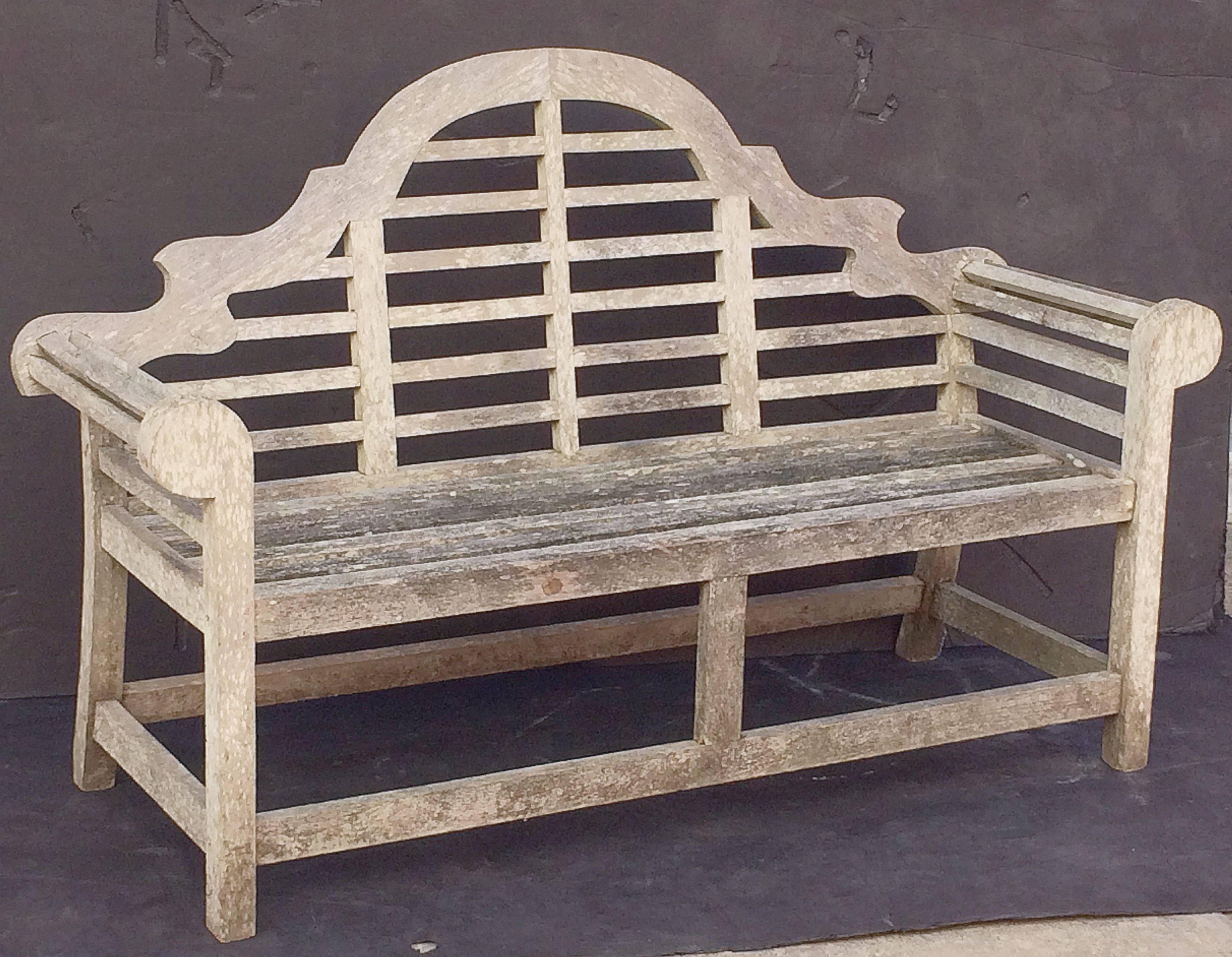 A vintage Lutyens style teak garden bench after Sir Edwin Lutyens, the British architect renowned for his imaginative, classic designs throughout England, Ireland and New Delhi (India).

Featuring a high-arched back for comfort and graceful,
