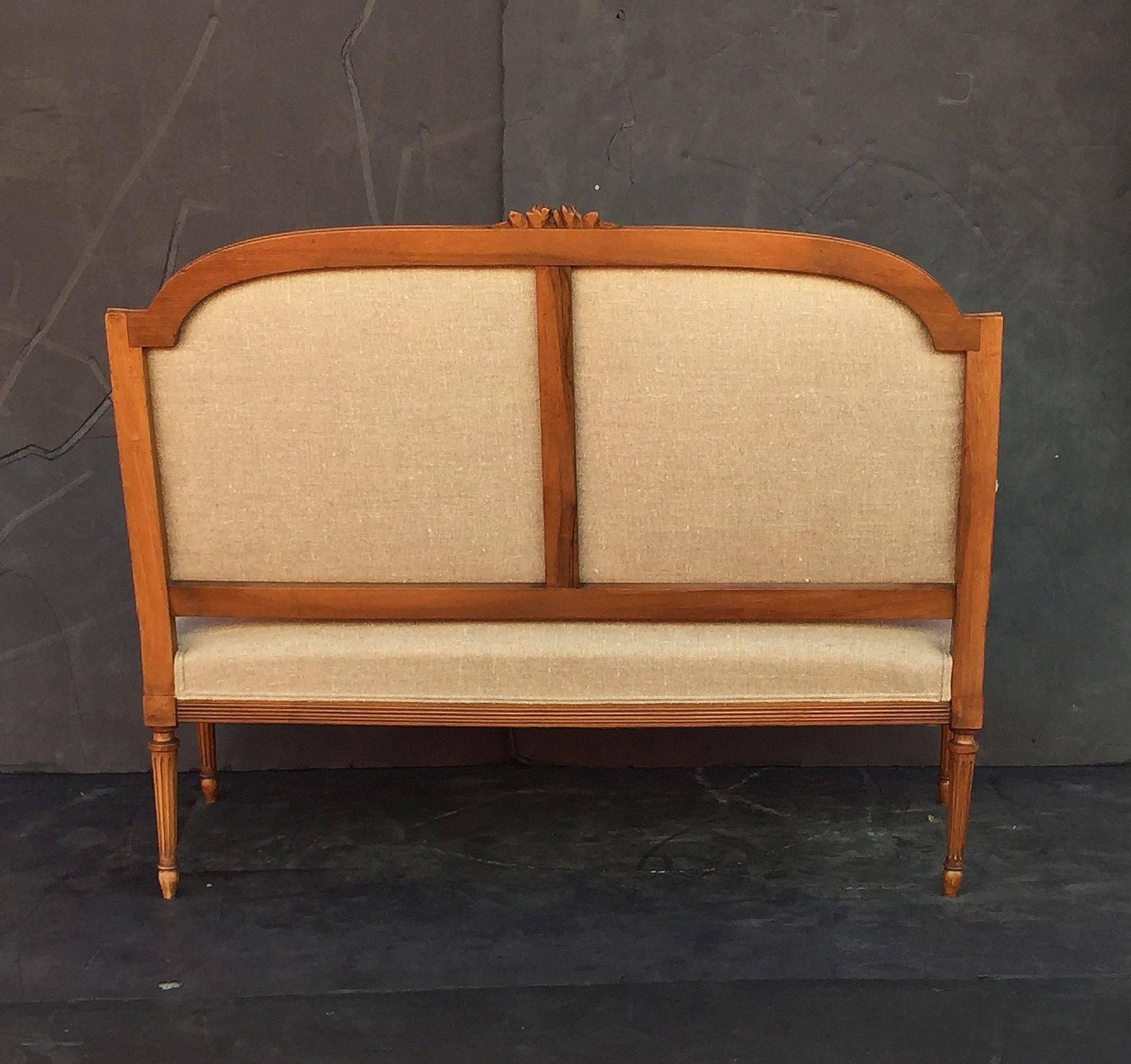 French Upholstered Settee of Carved Walnut 1