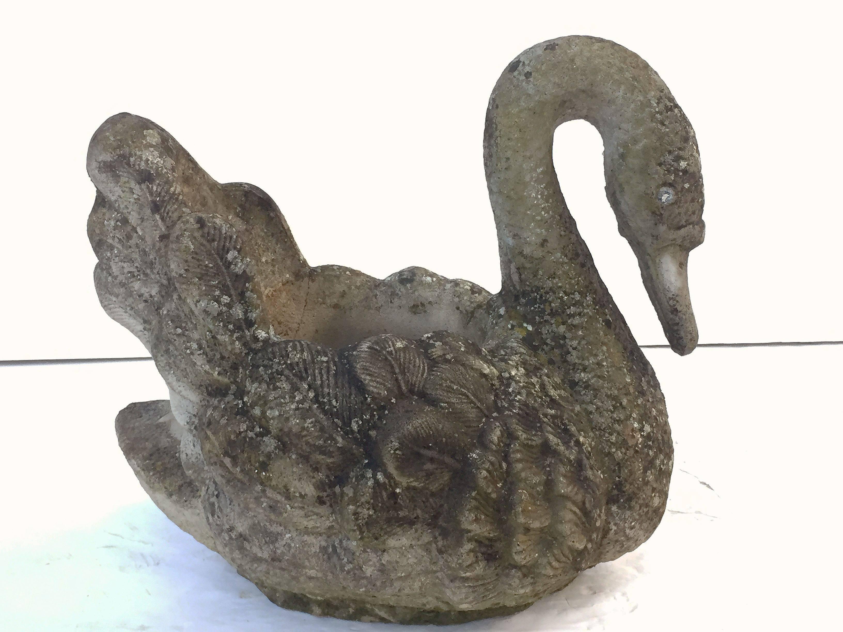 A large English garden planter of composition stone in the form of a swan, featuring graceful lines and fine detail.

Perfect for a garden room or conservatory!