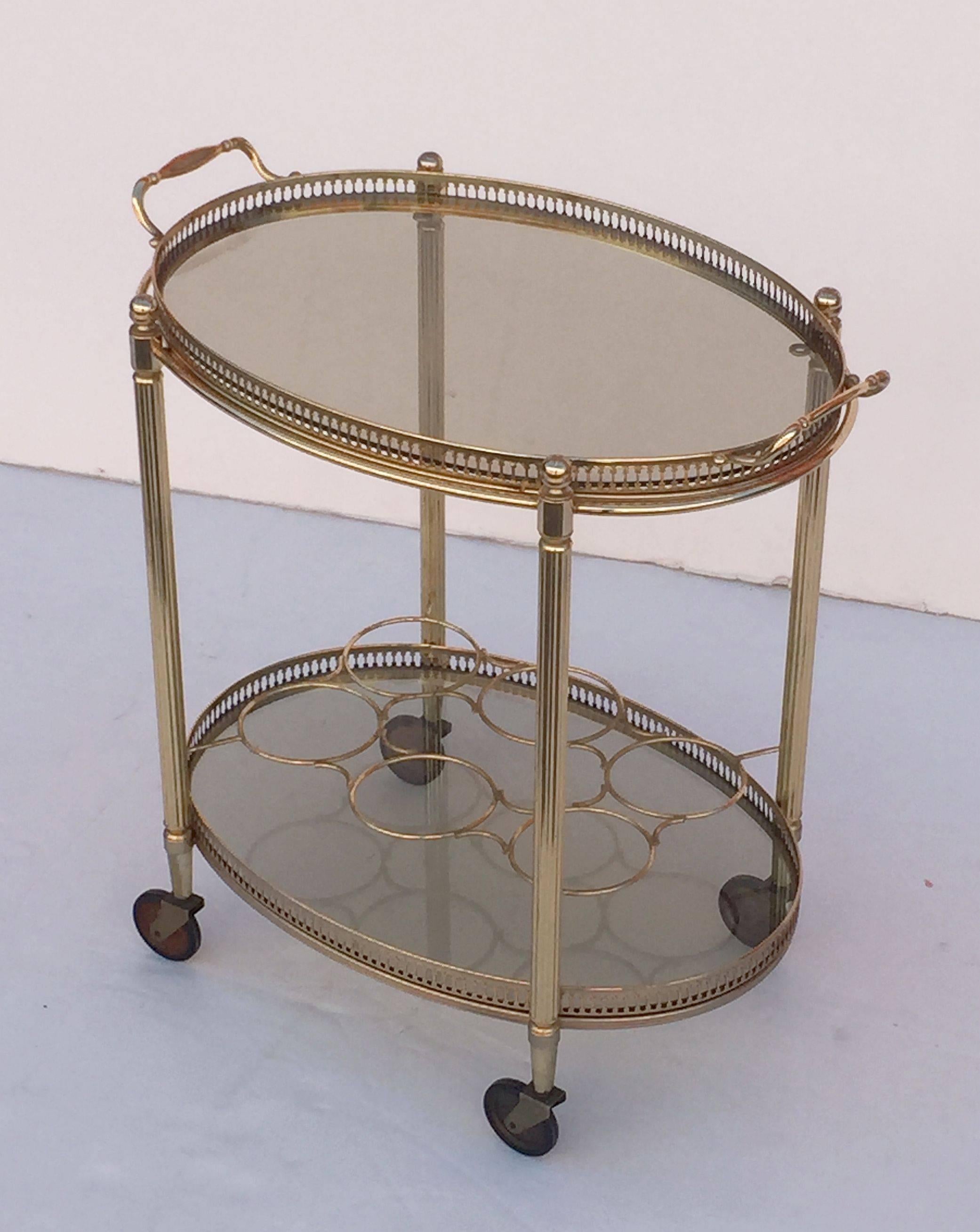 French Oval Drinks Cart of Brass and Smoked Glass with Serving Tray Top In Excellent Condition In Austin, TX