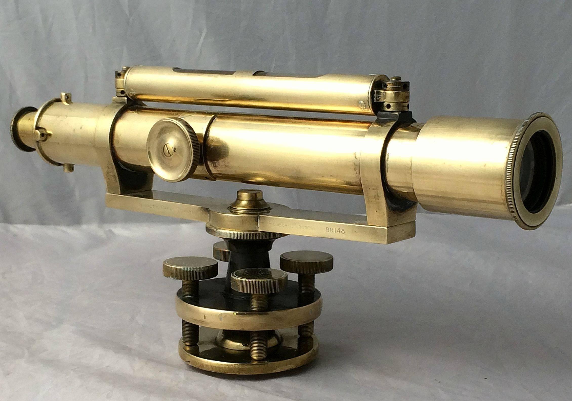 A fine working English surveyor's theodolite or transit instrument (aka a dumpy level or surveyors level) of brass, No.80148, by W.F. Stanley (Great Turnstile, Holborn, London), circa 1930, in original fitted wooden box. 
With attached spirit level