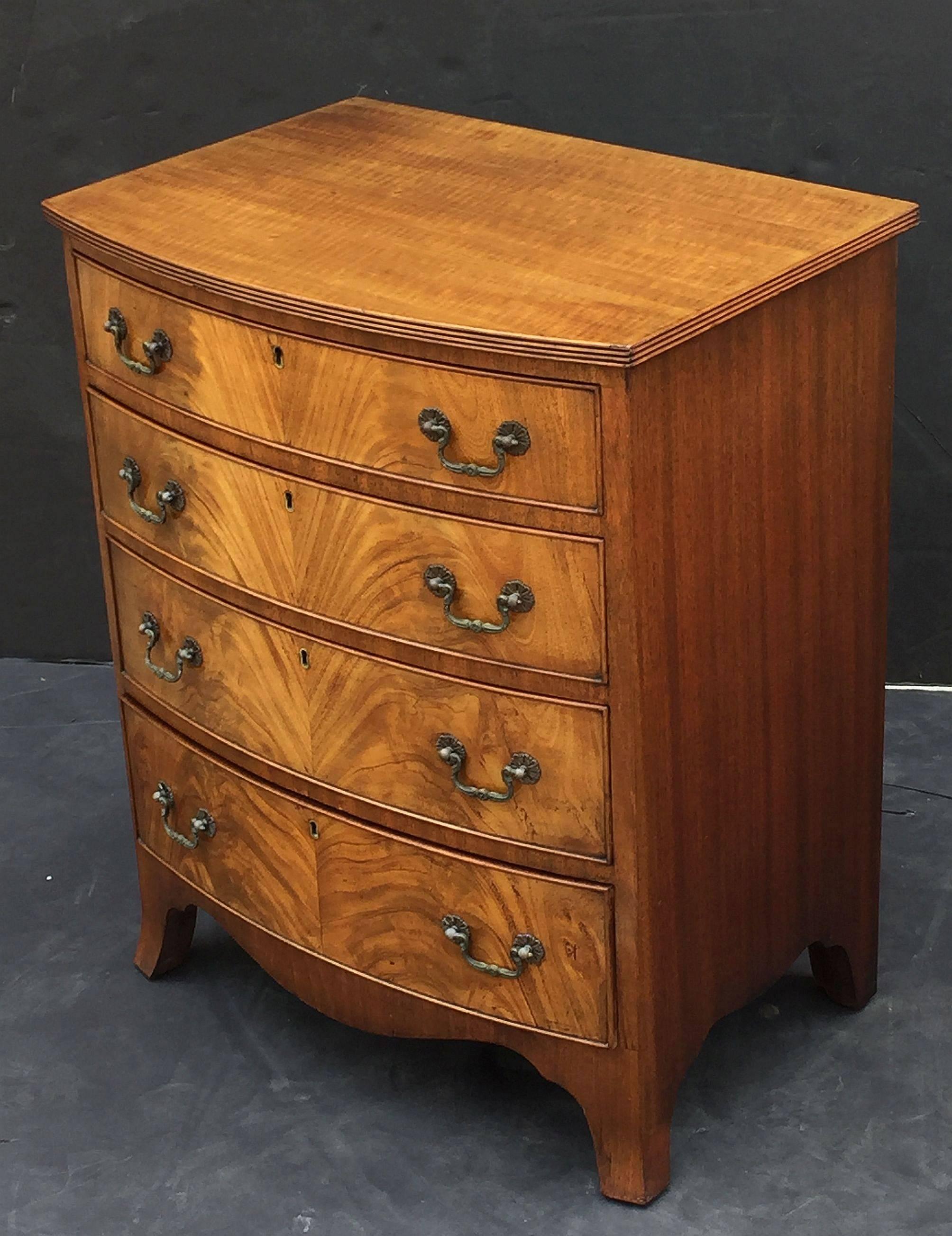 English Bow Front Small Chest of Flame-Cut Mahogany In Excellent Condition In Austin, TX