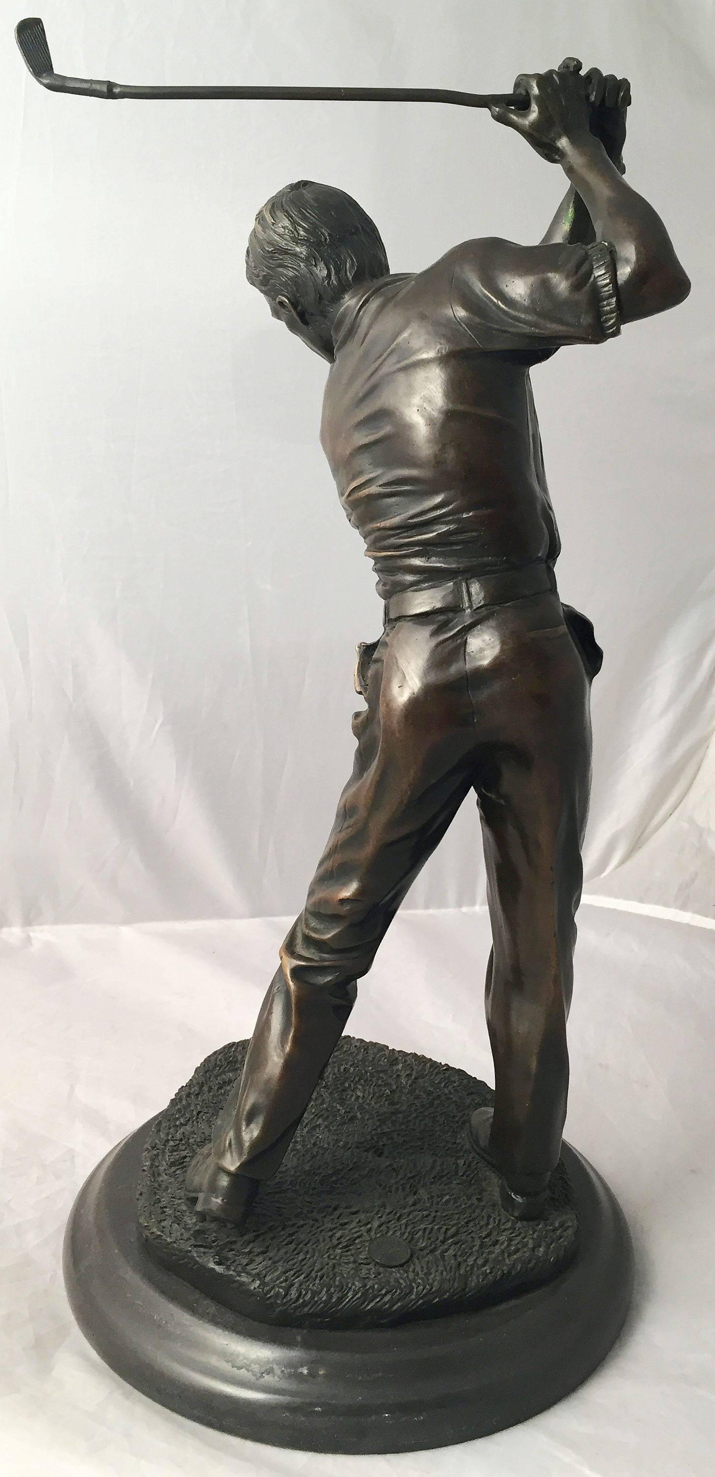 A fine large French figural bronze of a golfer on a round marble base.

Raised mark reads: Bronze Garanti - Paris - J.B. Deposee

Dimensions are height 17 1/2 inches x diameter 9 inches.