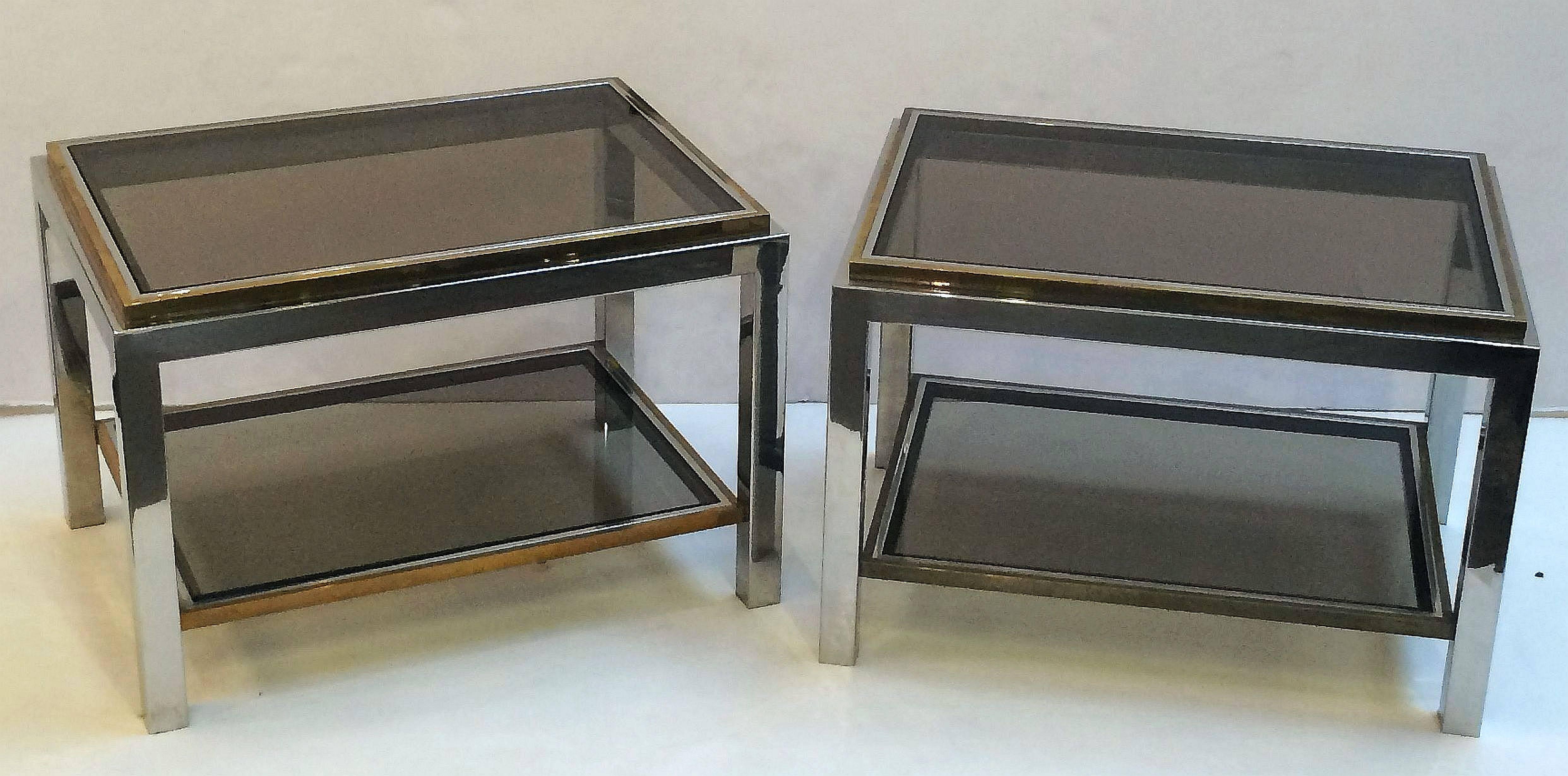 A handsome pair of cocktail or low tables by the celebrated designer, Willy Rizzo.
Featuring a stylish modern design of smoked glass and chromed brass.

Pair of low table dimensions:

Each table H 19