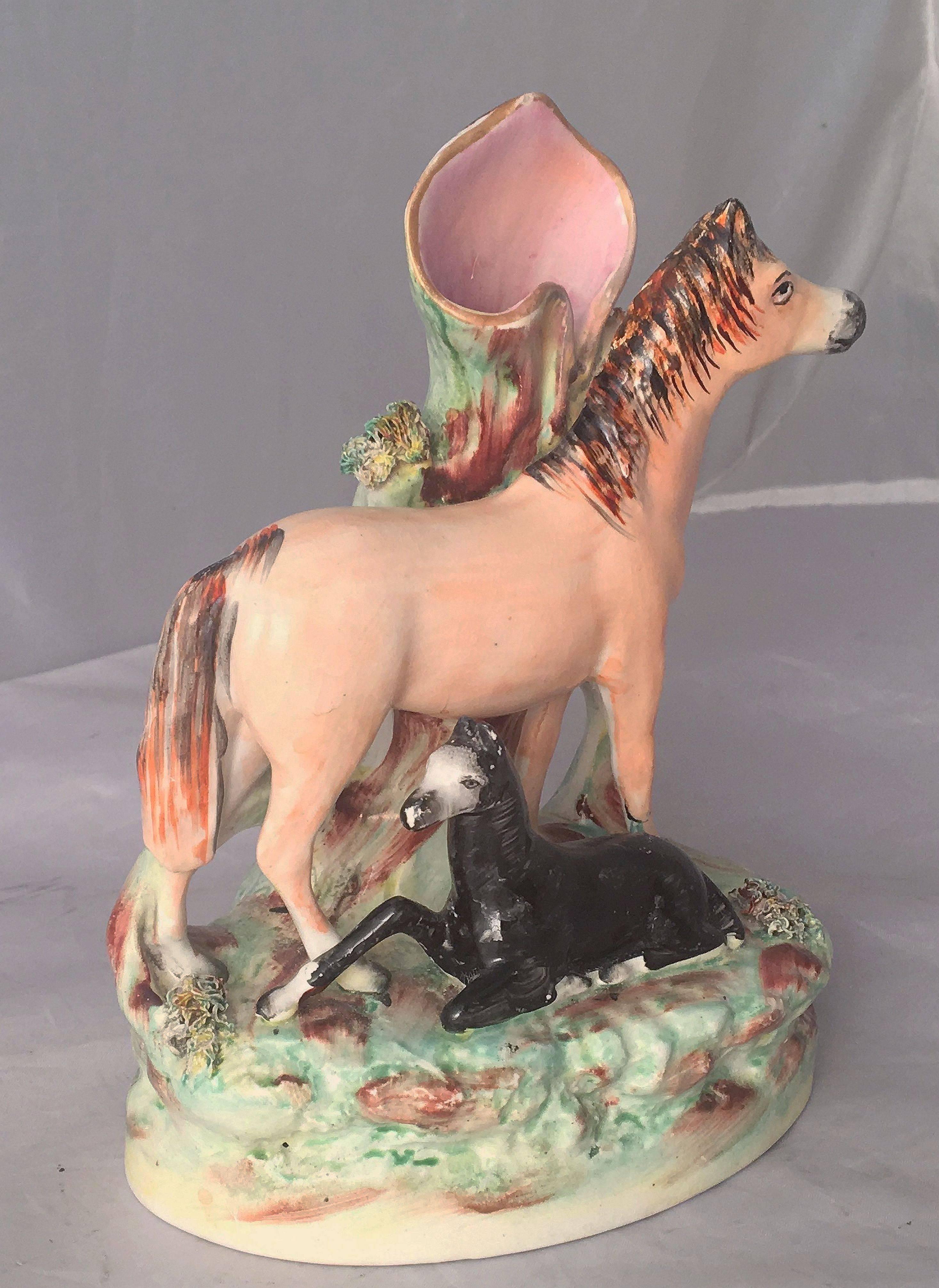 Earthenware Pair of 19th Century English Staffordshire Horses with Foals