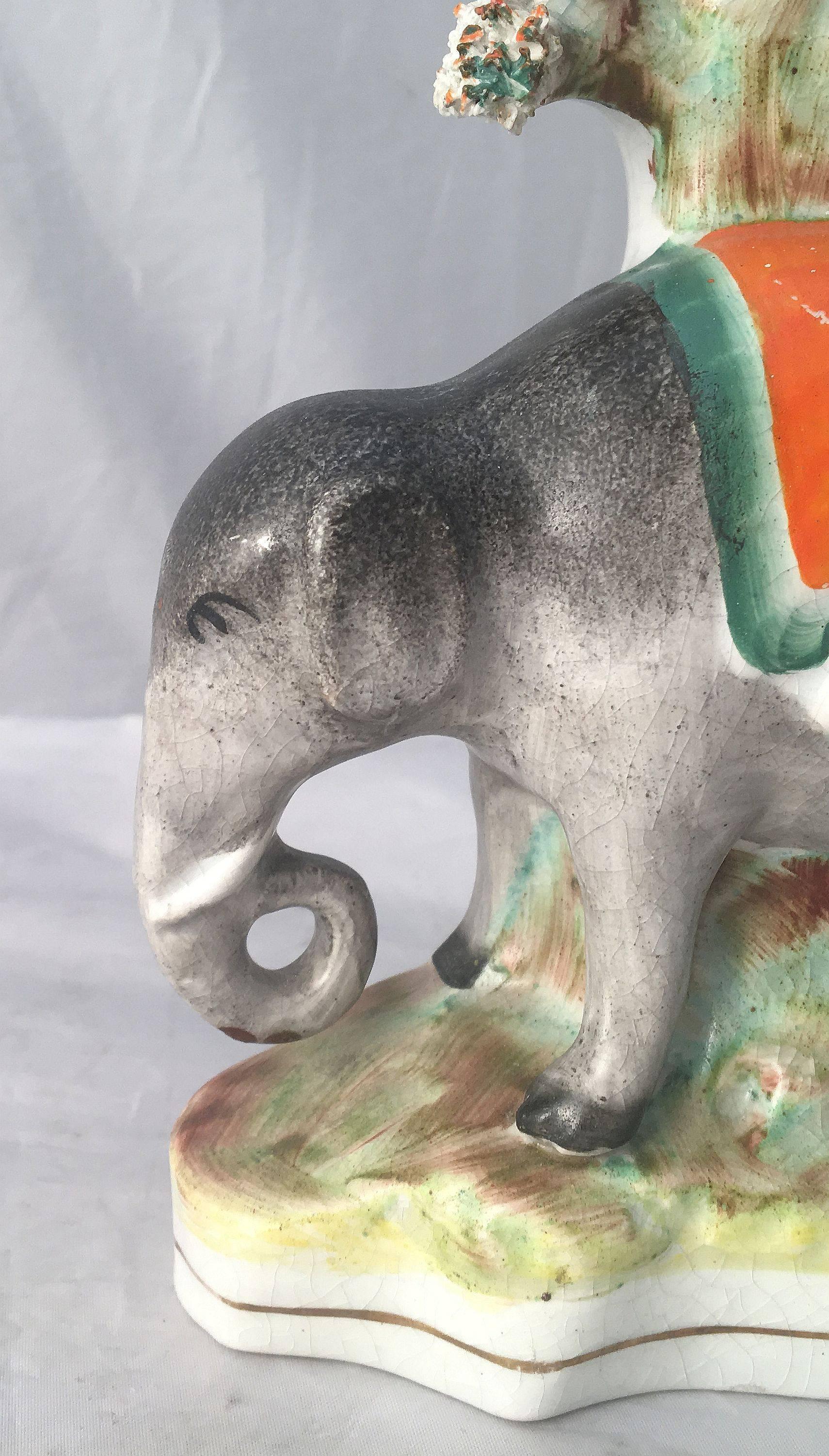 Pair of 19th Century English Staffordshire Elephants In Good Condition In Austin, TX