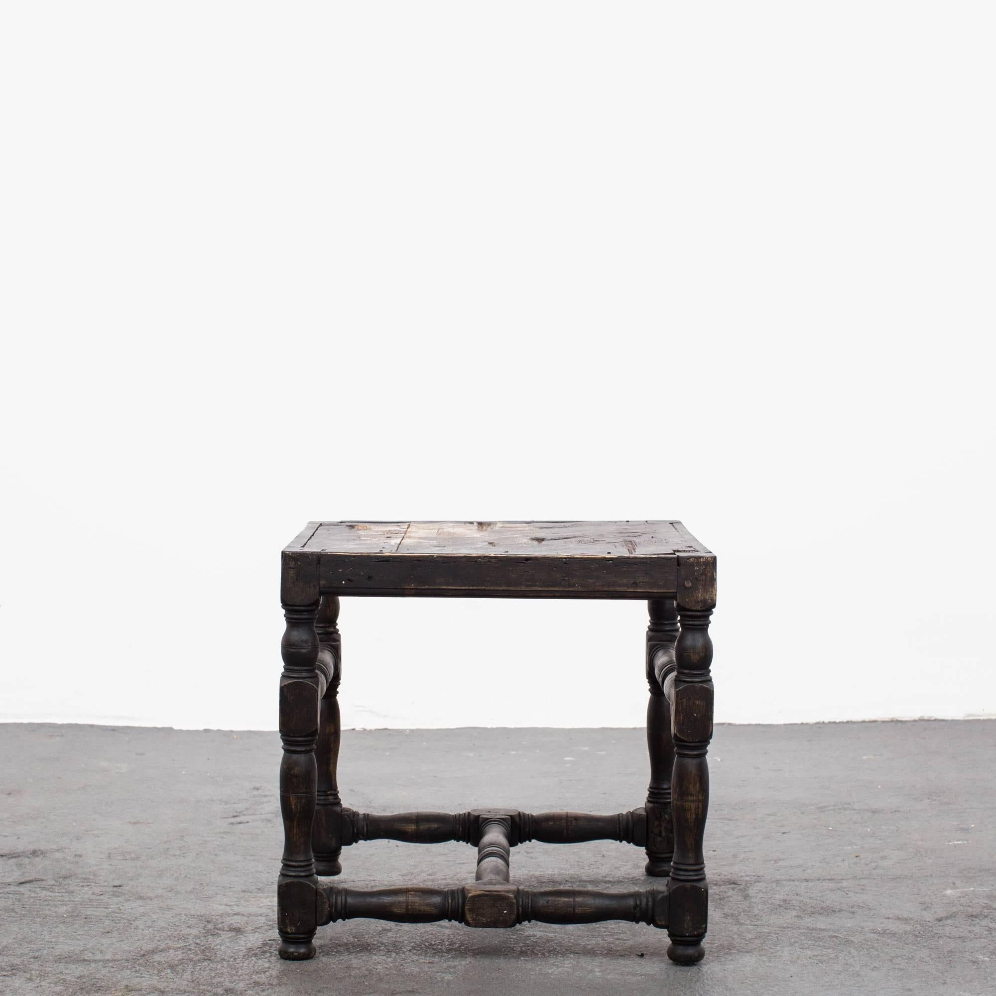 A stool made during the Baroque period in Europe. Painted in our Laserow black and currently un-upholstered.