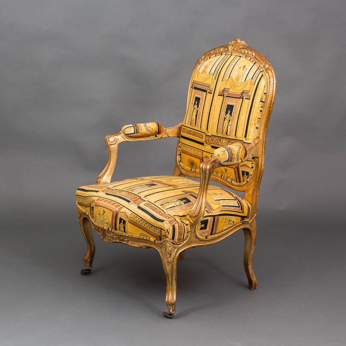 An armchair made during the 19th Century in the Louise XV style with a generous seat. Frame in giltwood. Upholstered seat, back and armrests. 

