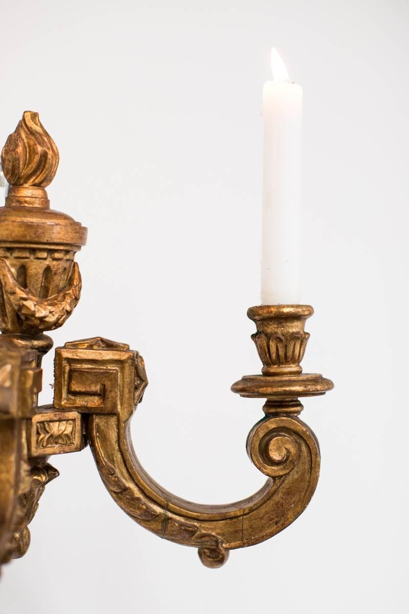 Wall Sconces Giltwood French 19th Century France. A pair of giltwood wall sconces made during the 19th century Louise XVI in Southern part of Europe. Two arms for candles. Not wired. 
