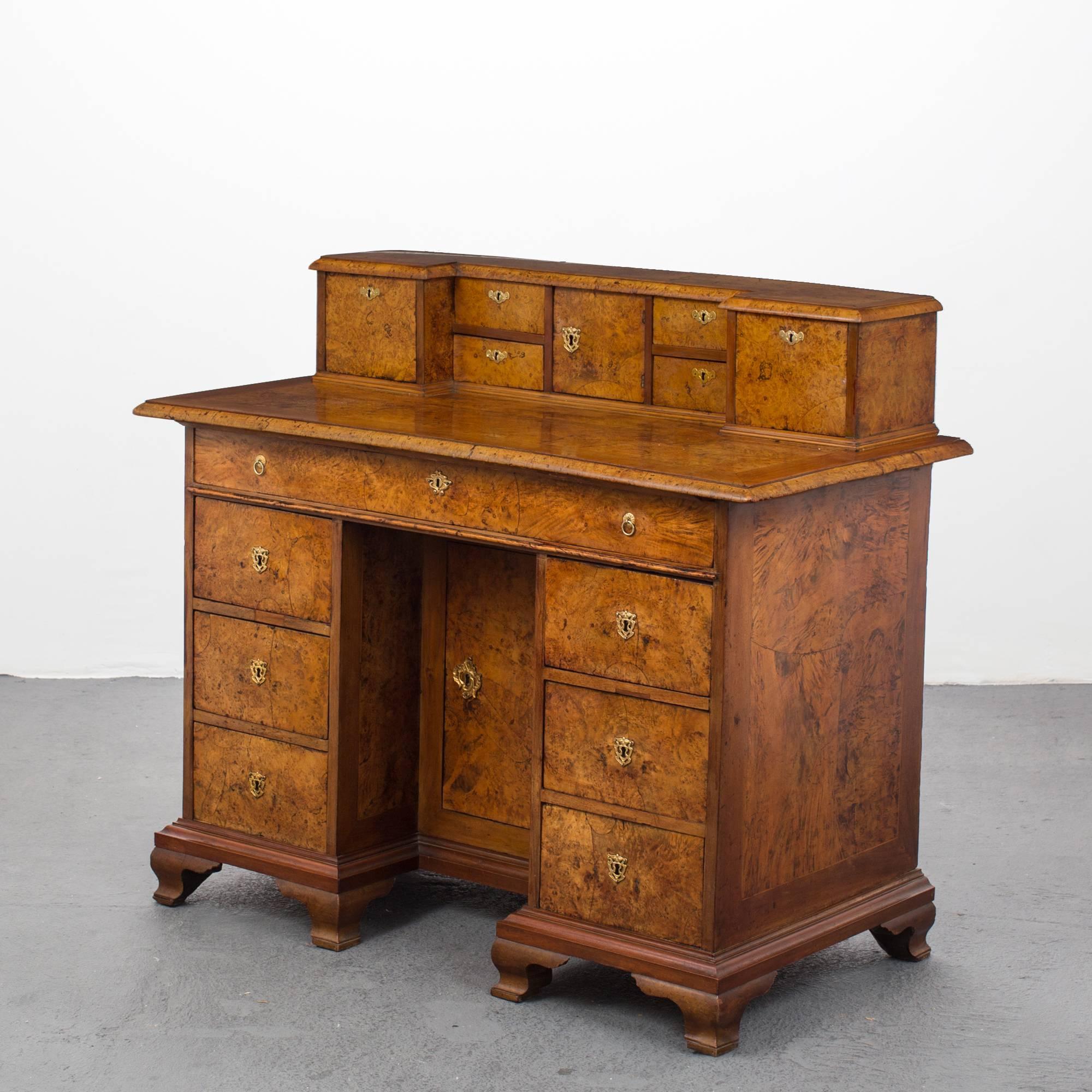 Desk Swedish Baroque Period 18th Century Veneer Sweden. A stunning desk made during the Baroque period in Sweden. Veneered with elm and burl wood. Brass hardware added later but not contemporary. Legs might not be original. 