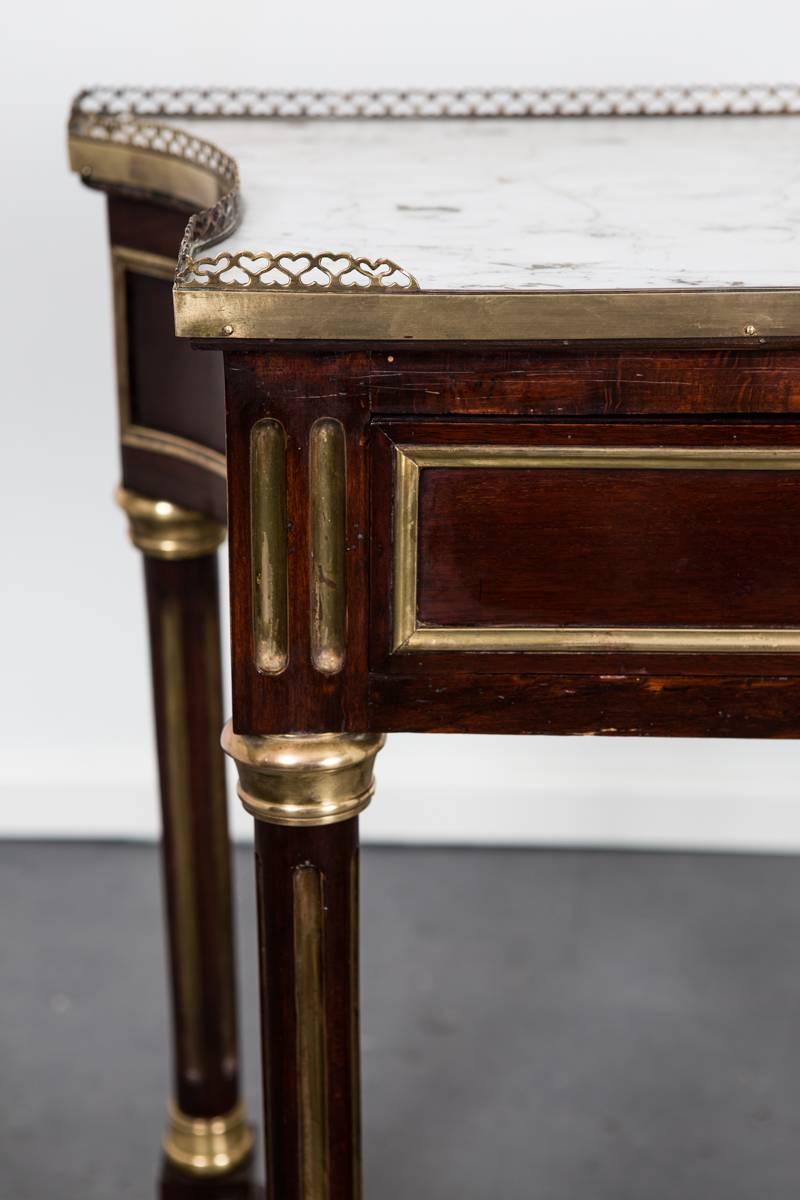 Table Side French late 18th Century Directoire Mahogany Marble France . 
A French side table a so called console dessert from the period Style Directoire. This period is the transition between Louis-seize and Empire. Made in mahogany with