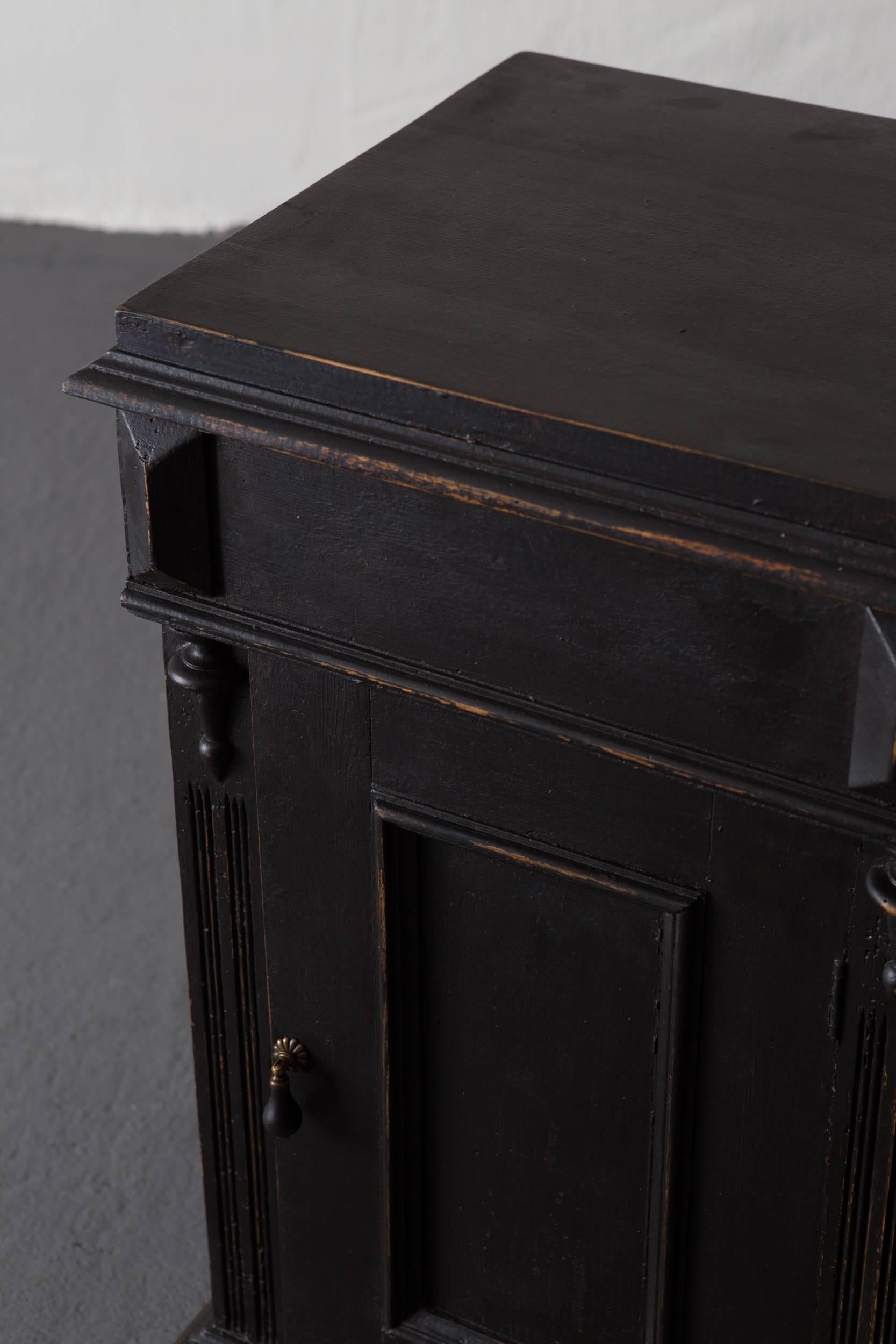 Nightstand 19th century, Swedish. A small cupboard made during the late 19th century, circa 1880 in Sweden. Painted in our Laserow black, new hardware.