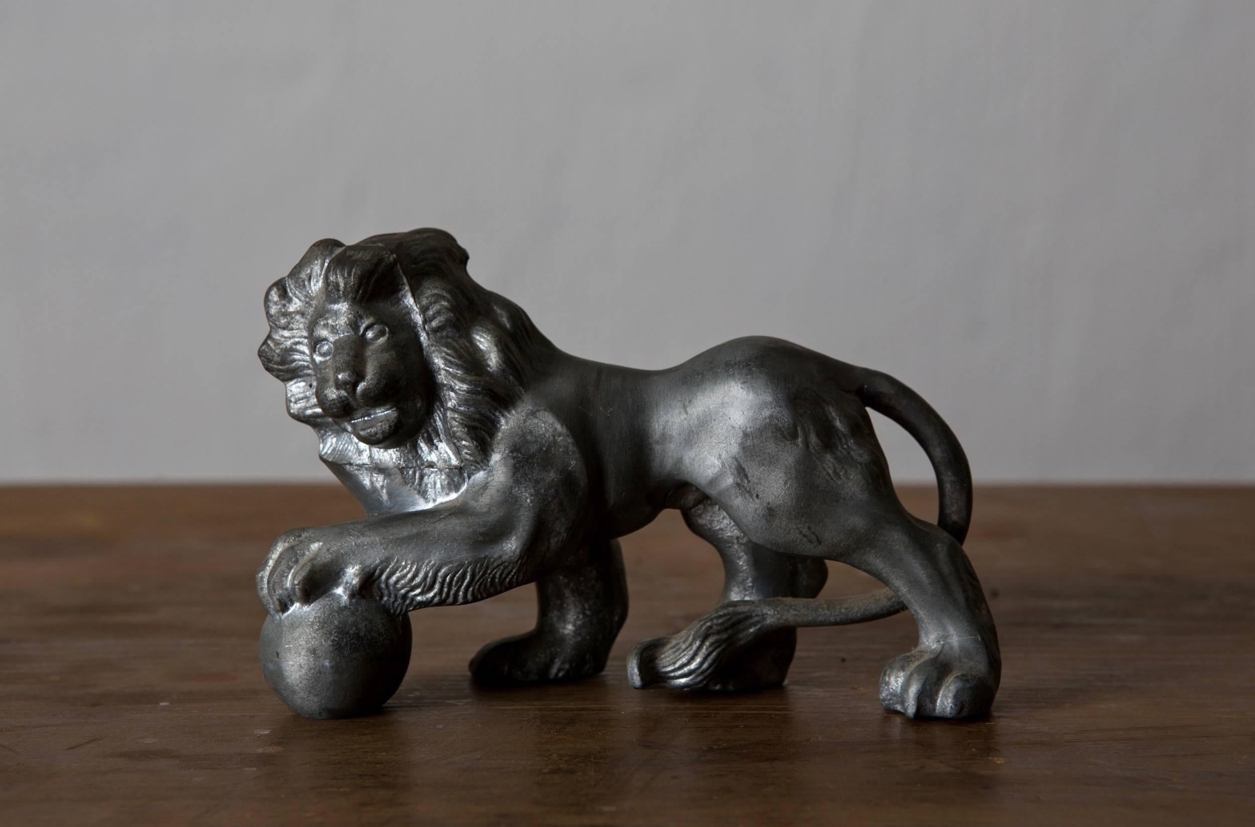 A Swedish lion made in pewter during the 20th century in Sweden. 

      