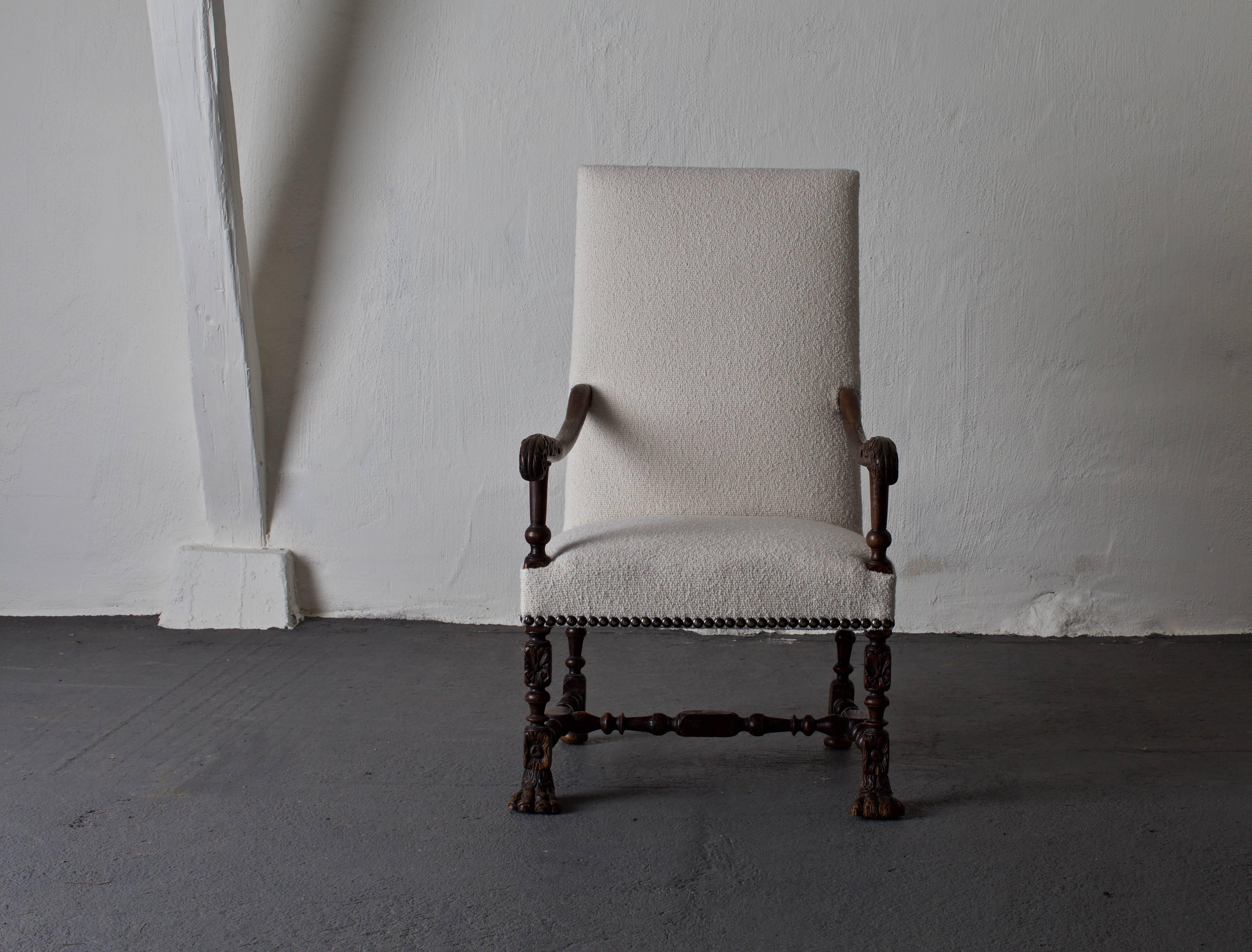 Armchair Swedish Baroque oak white wool fabric Sweden. An armchair made in Sweden during the early part of the Baroque period 1650-1730. Upholstered in a soft wool fabric from Rogers & Goffigon. Frame made from dark stained oak, original finish.