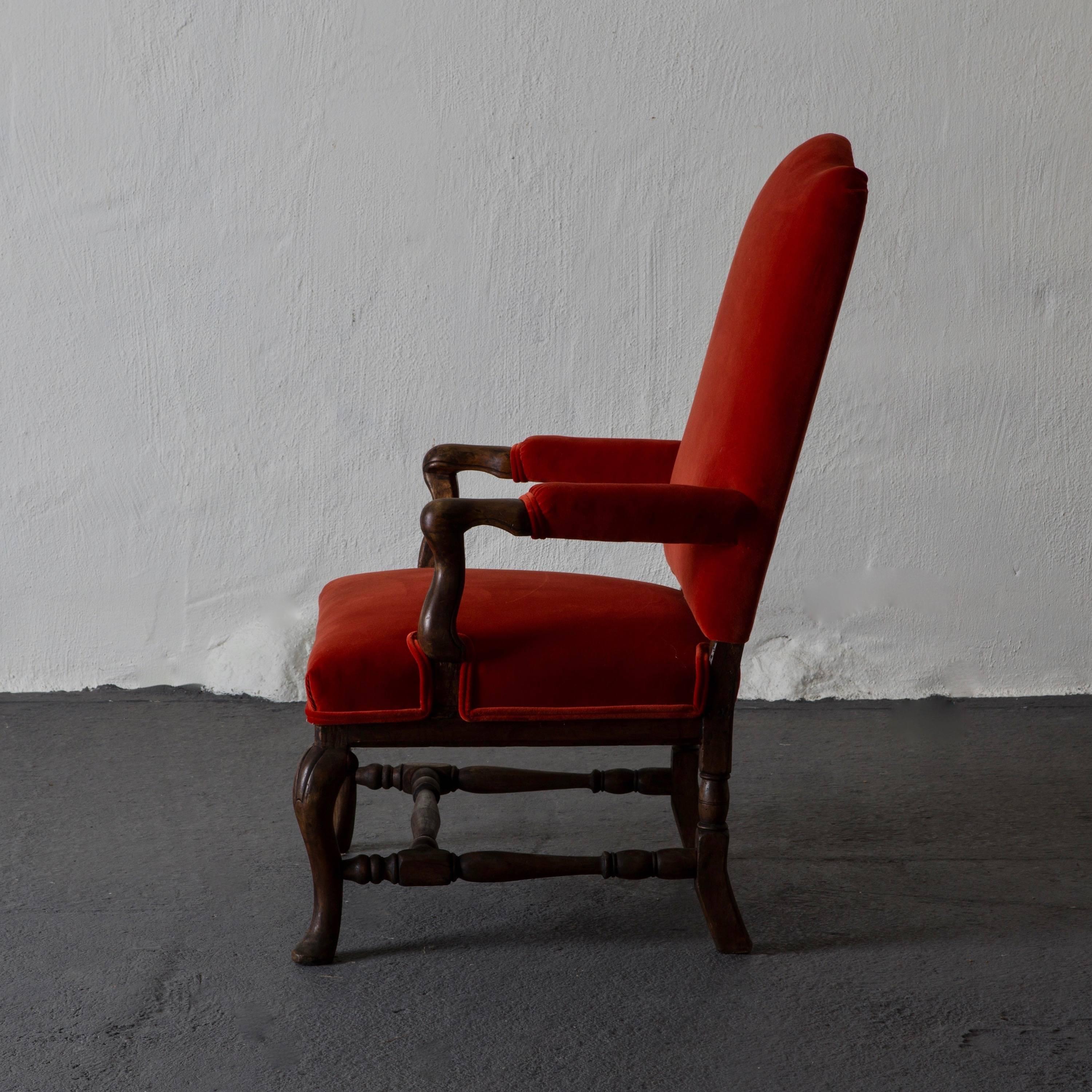 Armchair Swedish Baroque 18th century red Sweden. An armchair made during the 18th century in Sweden. Upholstered in a red cotton velvet. Double piping.