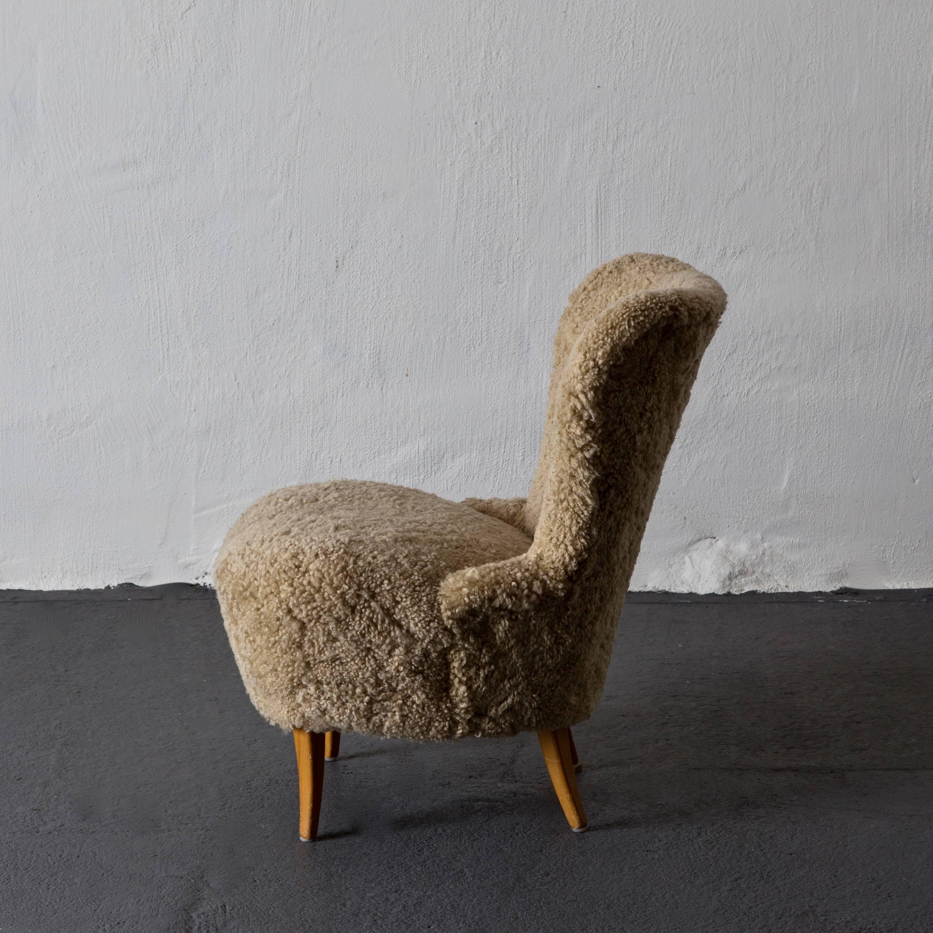 Chair Swedish sheepskin, 1950s, Sweden. A chair made in Sweden during the 1950s. Upholstered in sheepskin.
  