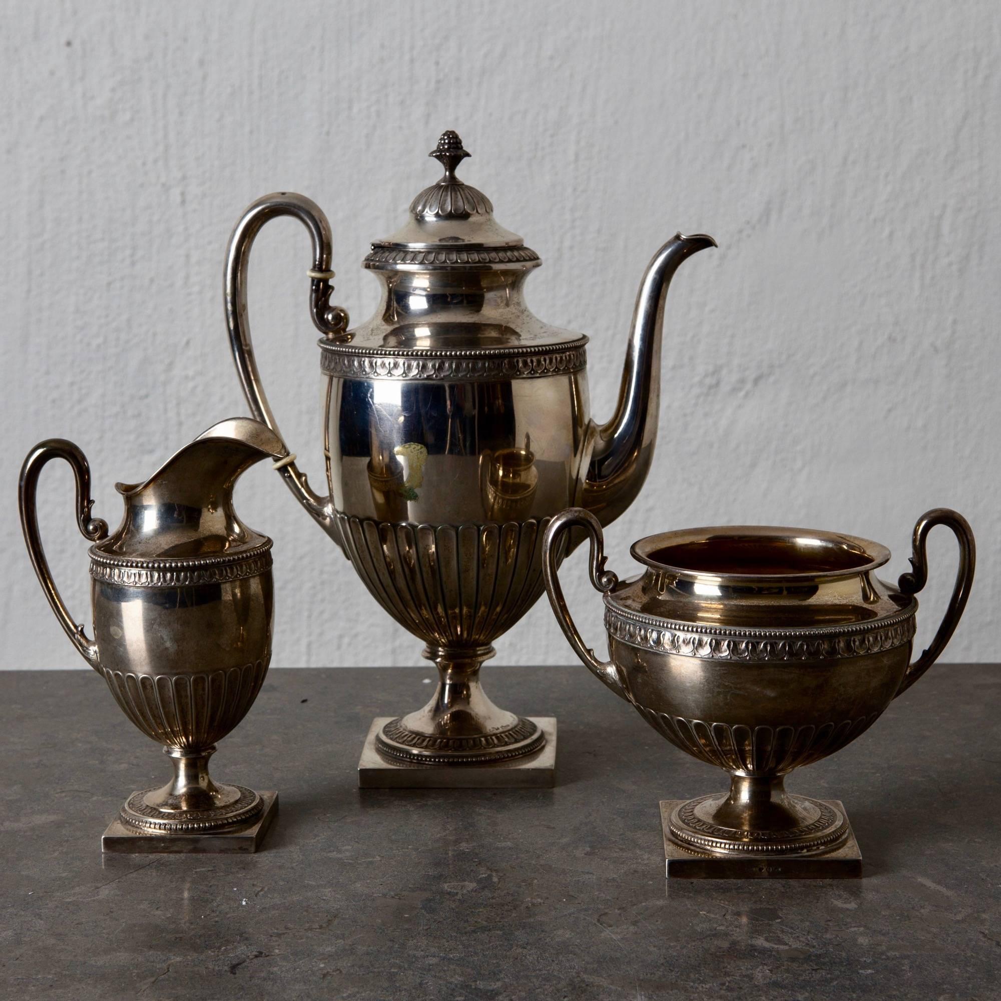 A coffee set made during the early 1900s (1902-1903) in Sweden. Stamped CG Hallberg.