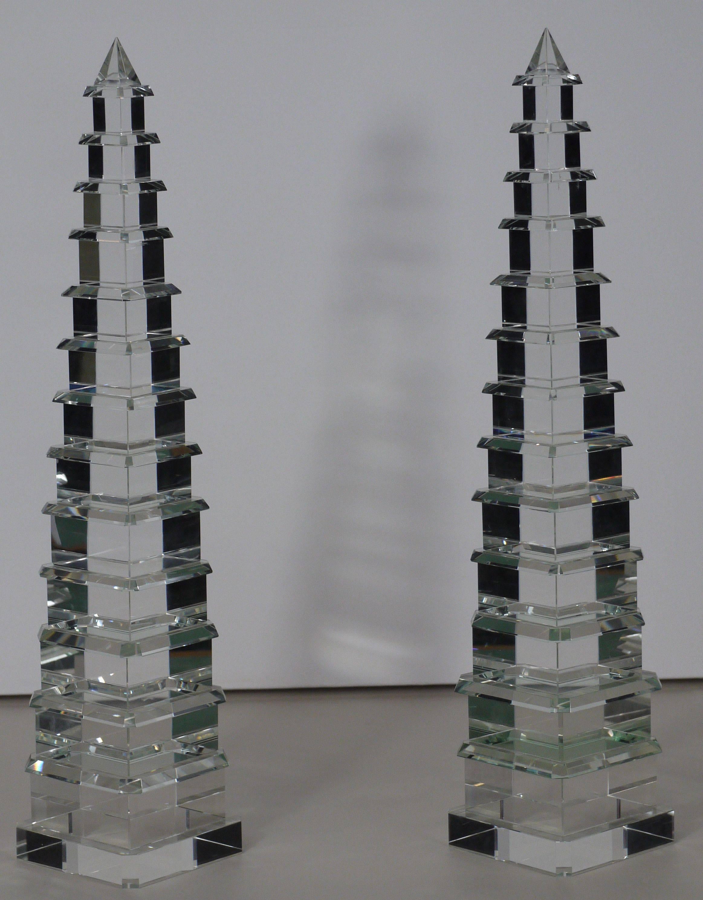 Stunning set of pagoda form cut crystal obelisks, circa 1980. Great shape and size seem to capture the light nicely without being overly blingy.