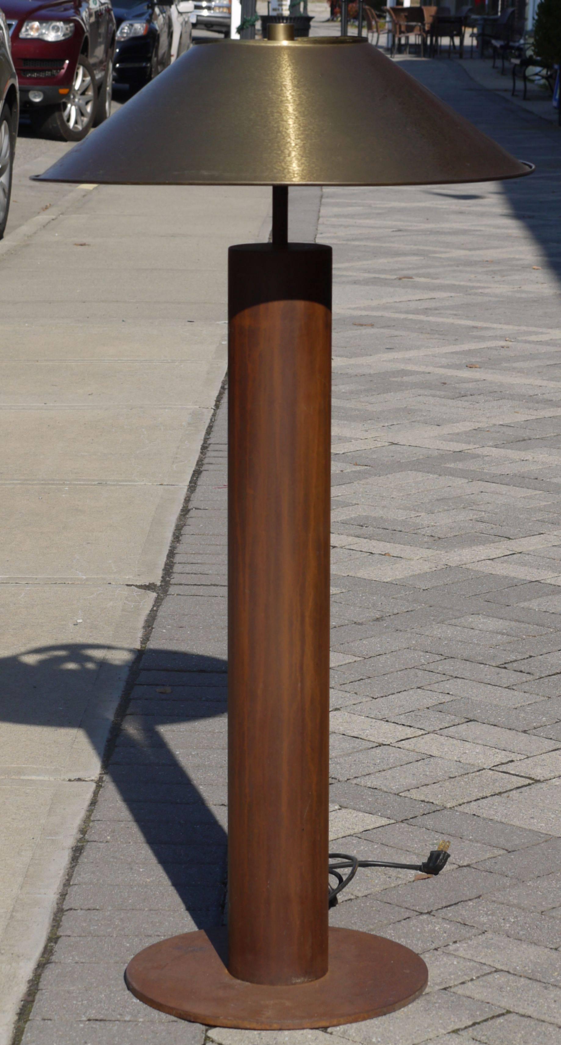 Corten steel floor lamp by Peter Preller for Tecta, Germany. Incredibly simple clean modernist design, almost Zen like in its simplicity and the construction is seamless. The low slung design of the floor lamp mixes well with modern furniture.