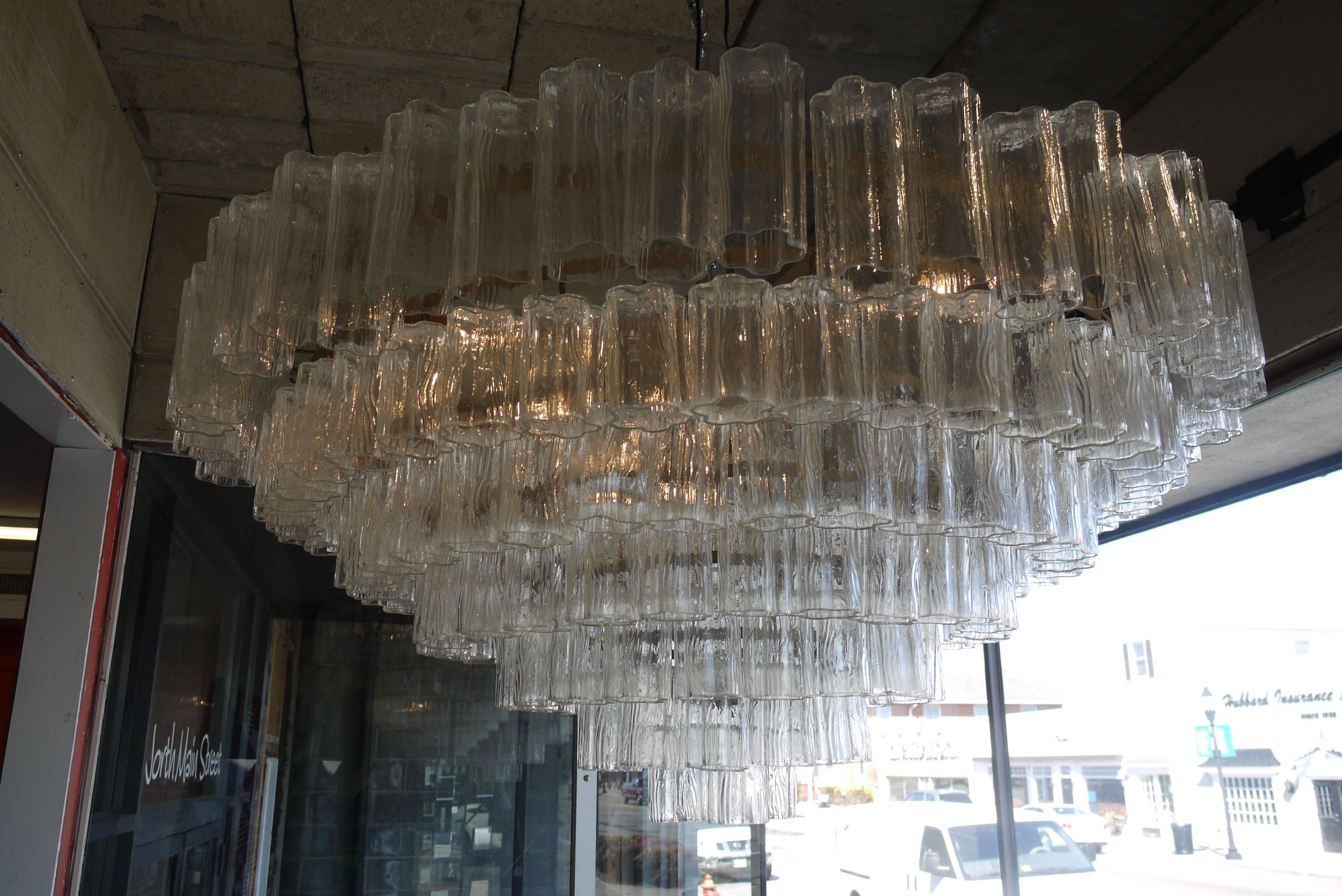 Stunning seven-tier chandelier by Venini for Camer. Great scale, usually the larger Murano chandeliers are really tall but this is a more useable size in that it is only 23 inches tall.