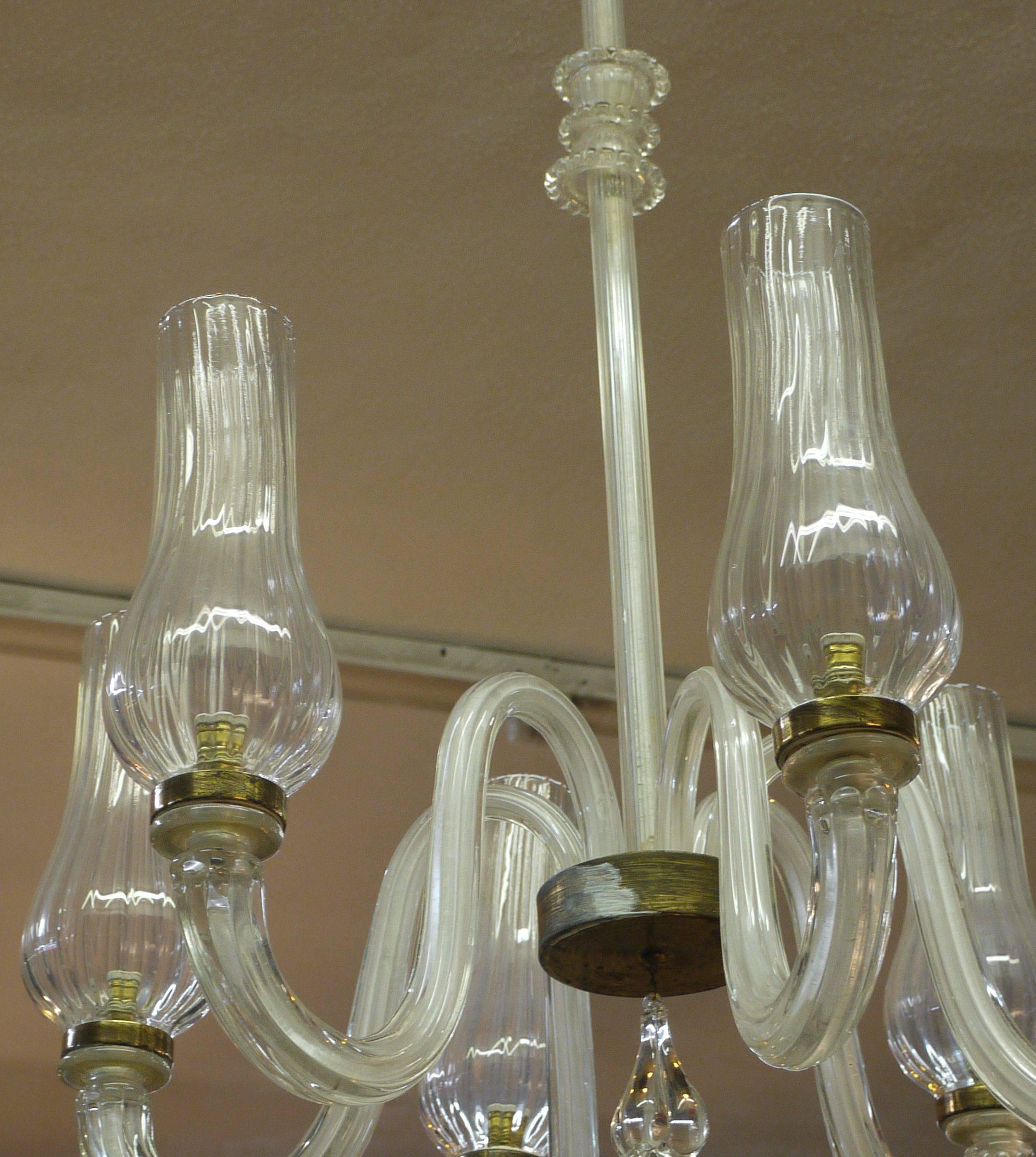 Simple, clean and elegant are the three words which best describe this pre war chandelier. Obviously the chandelier was influenced by Carlo Scarpa with its simplicity.