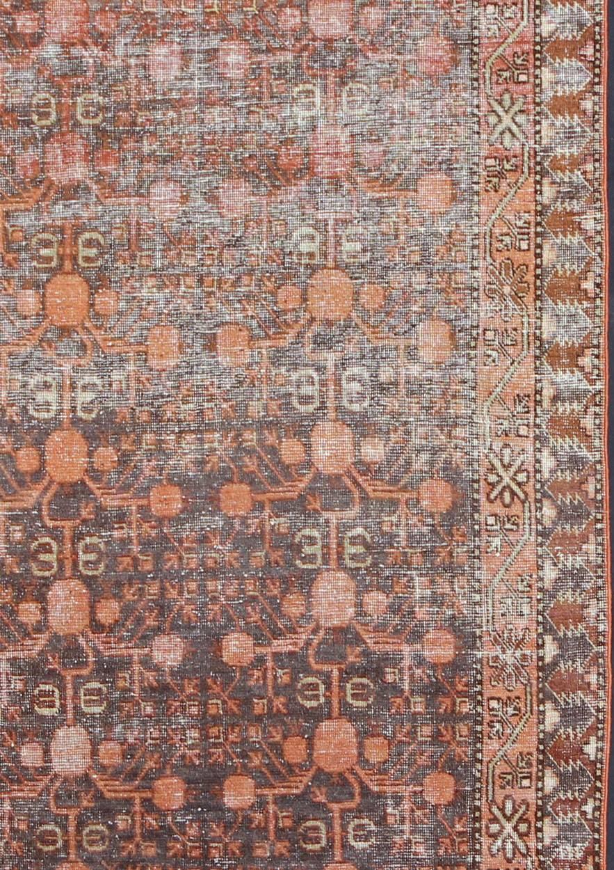 East Turkestani Antique Khotan Carpet in Charcoal, Burnt Red, Salmon and Taupe For Sale