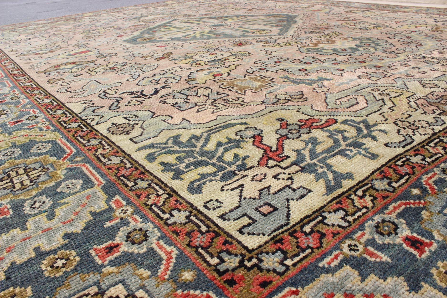 20th Century Hand Knotted Turkish Oushak Rug with Floral Design in Light Pink and Steel Blue  For Sale