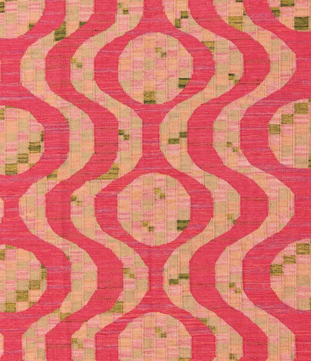 Scandinavian Design Flat-Weave Rug in Red, Salmon, Pink and Green.
This Scandinavian Flat-Weave patterned rug is inspired by the work of Swedish textile designers of the early to mid-20th Century. With a unique blend of historical and modern design,