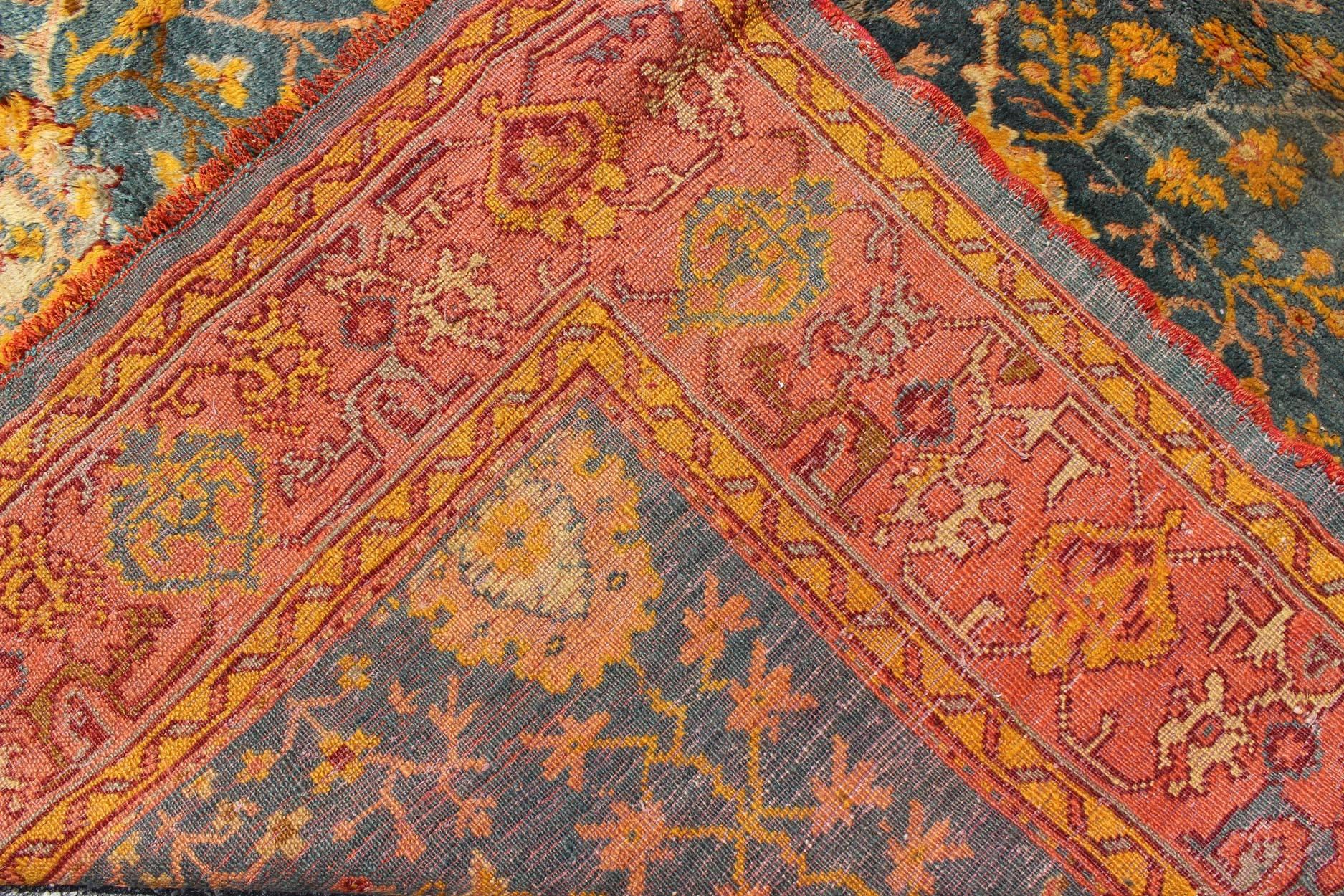 Hand-Knotted Antique Turkish Oushak Rug with Blue and Salmon Colors