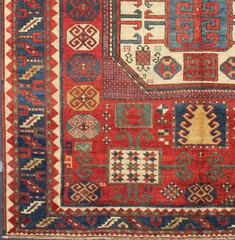 Antique Kazak Karachopf Rug with Octagon Medallion in Red, Blue and Green Tones