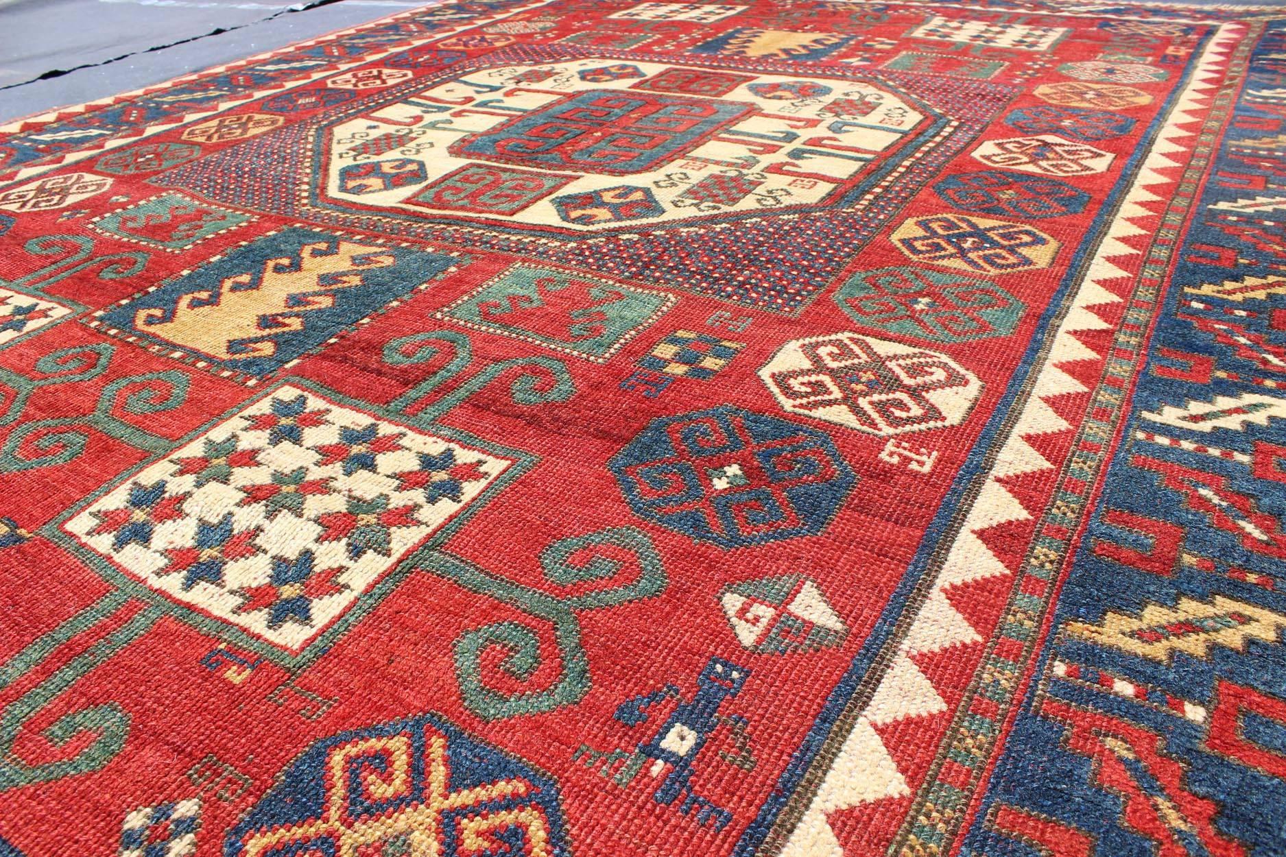 Hand-Knotted Antique Kazak Karachopf Rug with Octagon Medallion in Red, Blue and Green Tones For Sale