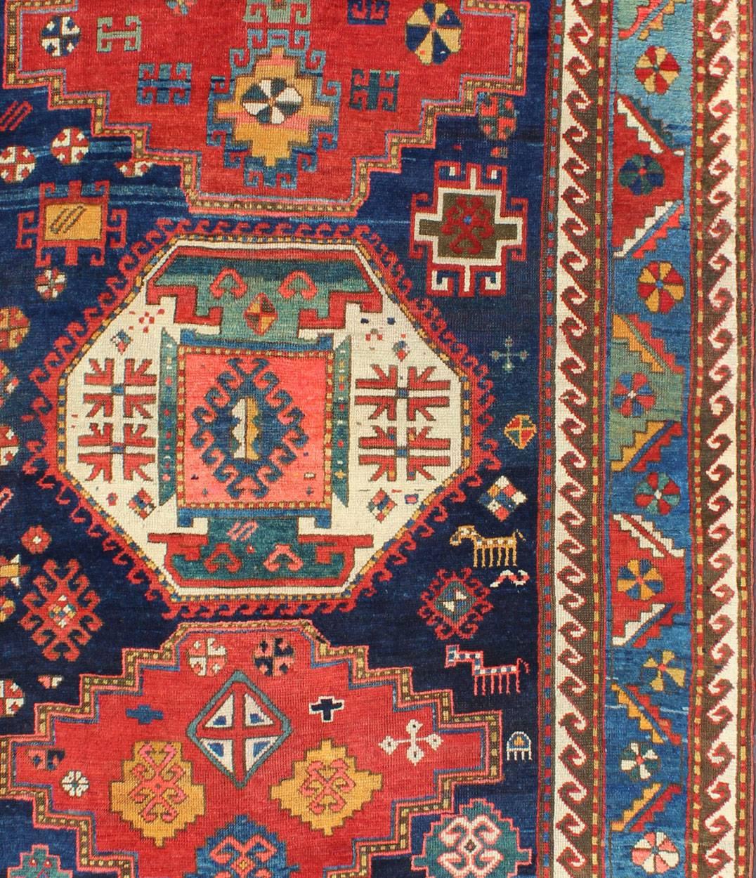 In superb condition, this unique antique Caucasian carpet, a striking, jewel-toned Lori Pambak piece, epitomizes the riveting artistry and color palette commonly utilized by this Kazak weaving region. The Caucasian weavers are renowned for the